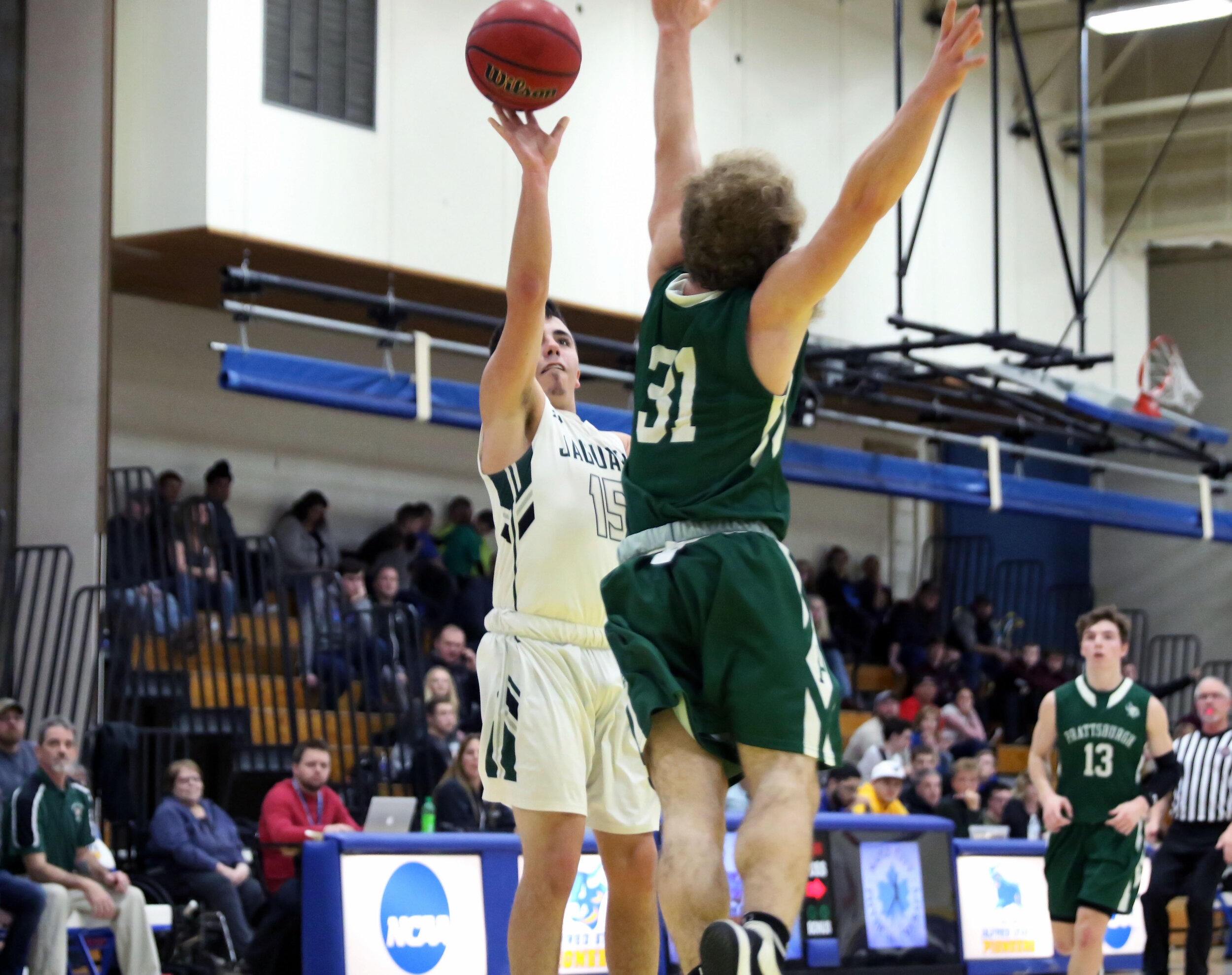  Genesee Valley senior Trevor Clark (15) puts up a floater over the Prattsburgh defense during the main event of the 6th Annual Dan Barkley Showcase at Alfred State College, Saturday evening. [Chris Brooks/WellsvilleSports.com] 