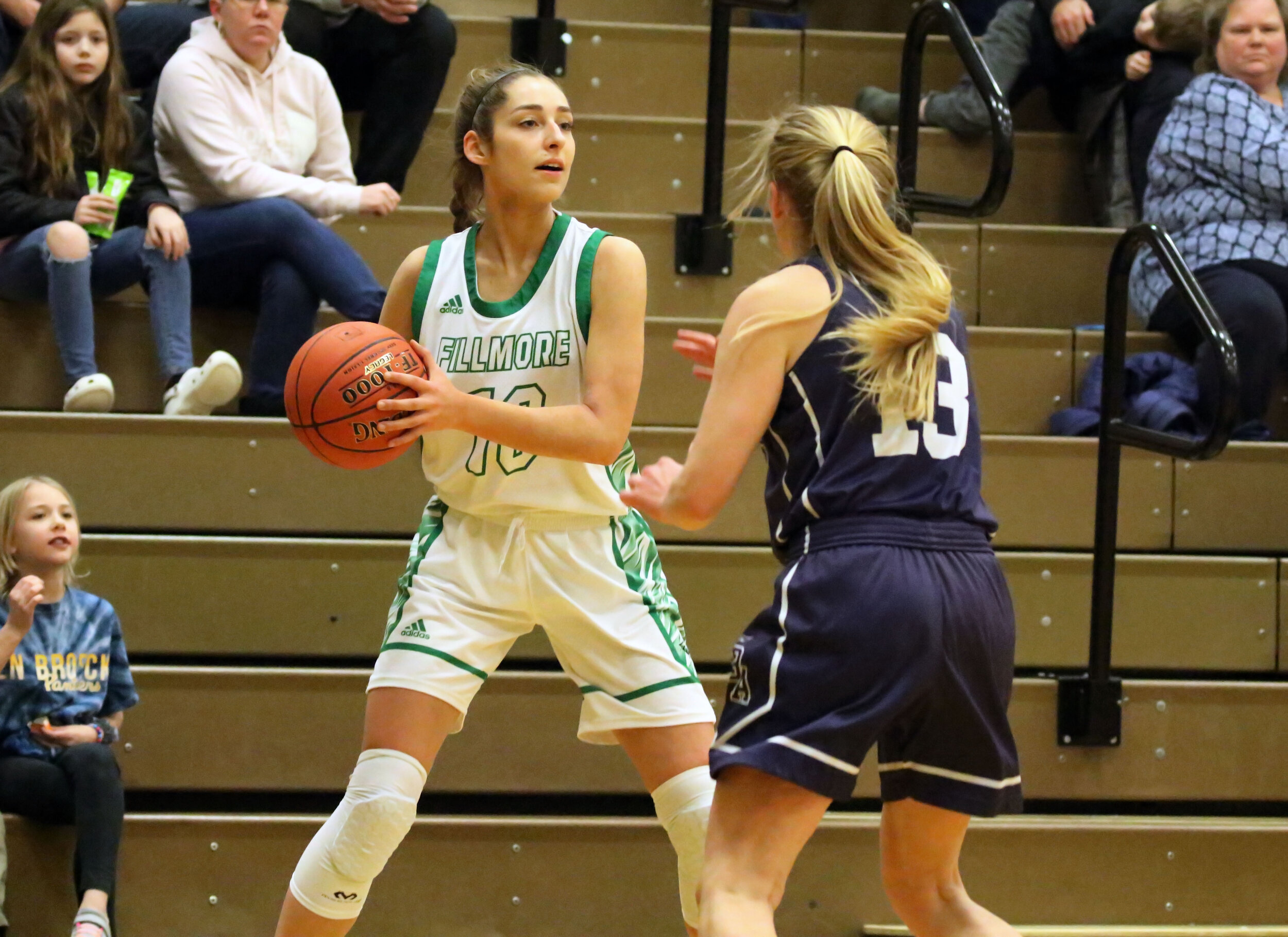  Fillmore senior Hannah Roeske (10) looks to make a pass to the outside perimeter against the Franklinville defense during Monday night’s home contest. [Chris Brooks/WellsvilleSports.com] 