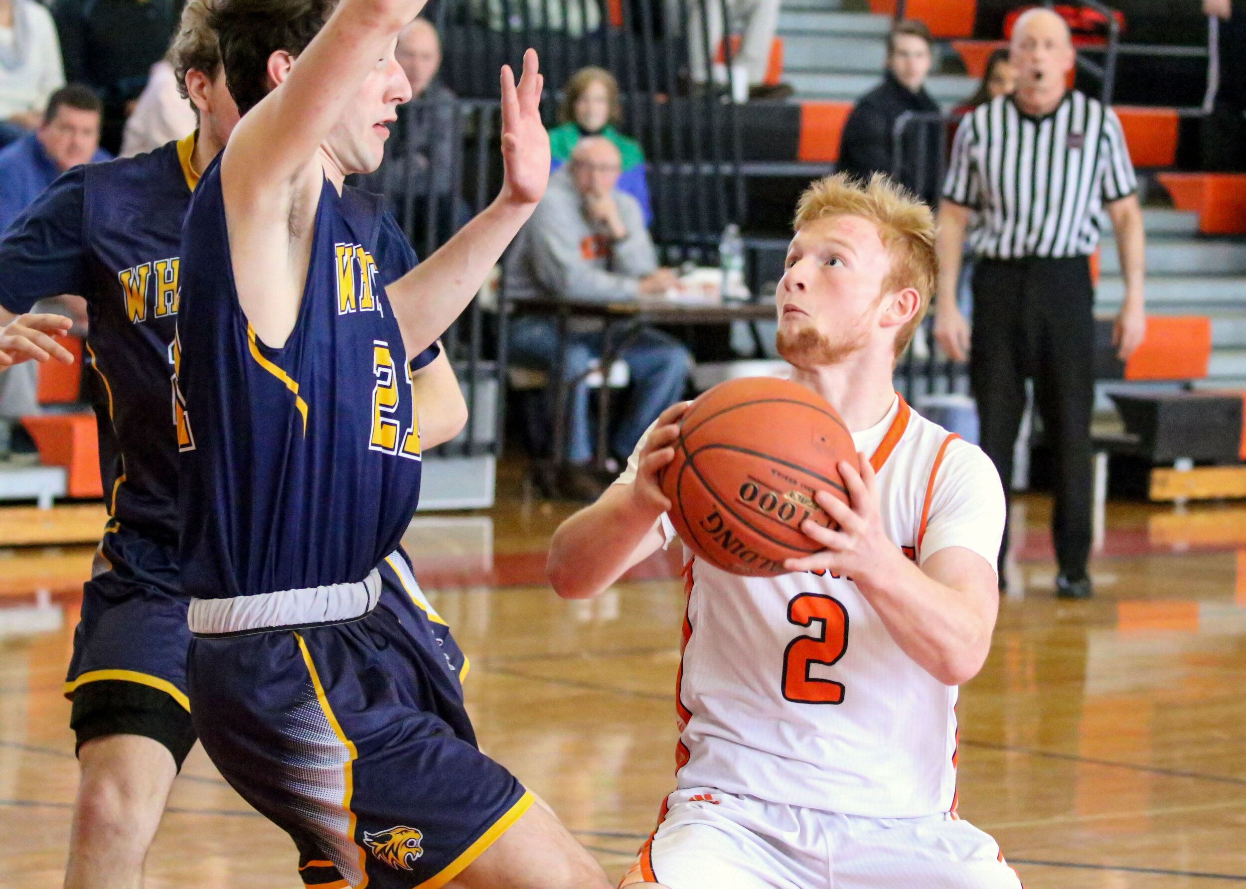  Wellsville junior Tyler Sands (2) looks to put up a shot inside against the Marcus Whitman defense during Saturday afternoon’s regular season home finale. [Chris Brooks/WellsvilleSports.com] 