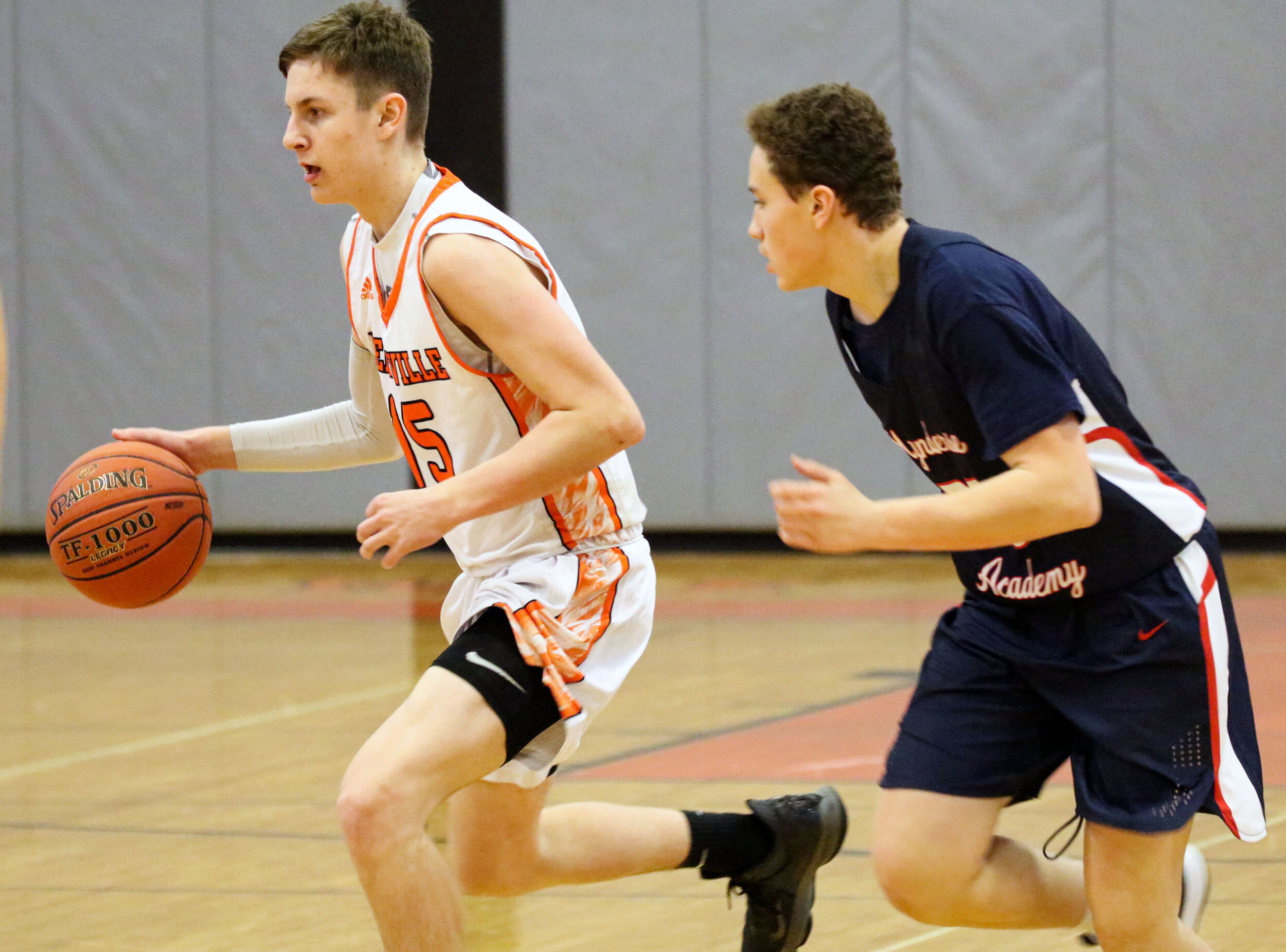  Wellsville’s Alex Perkins (15) pushes his pace around to the outside against the Mynderse defense during Saturday afternoon’s Class B2 Quarterfinal matchup in Wellsville. [Chris Brooks/WellsvilleSports.com] 
