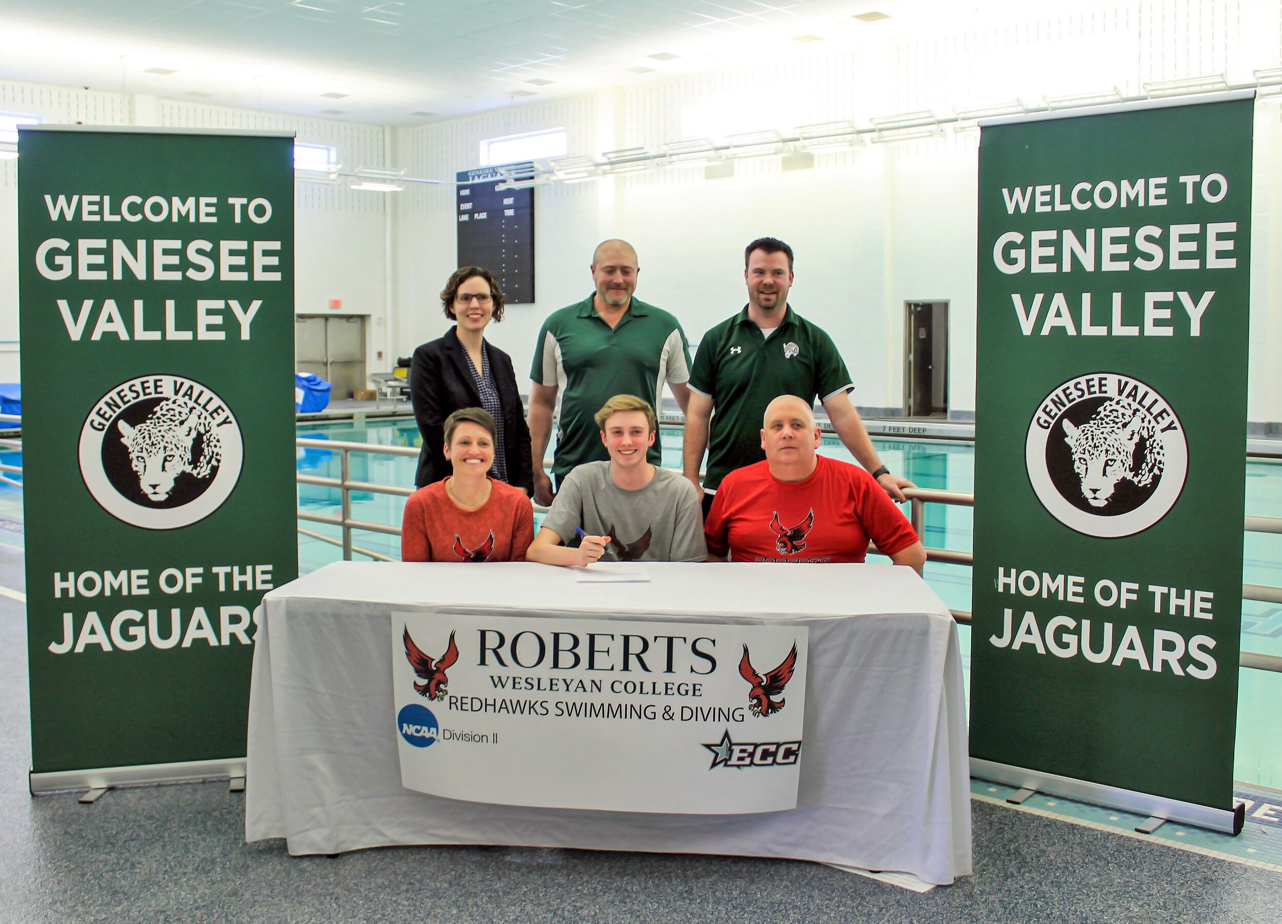  Back on March 5 at Genesee Valley, Jaguars senior swimmer Gavin Hand sat alongside his parents, Deanna and Tim to pen the next chapter of his athletic career, as he furthers his swimming journey onto the collegiate level at Roberts Wesleyan College.