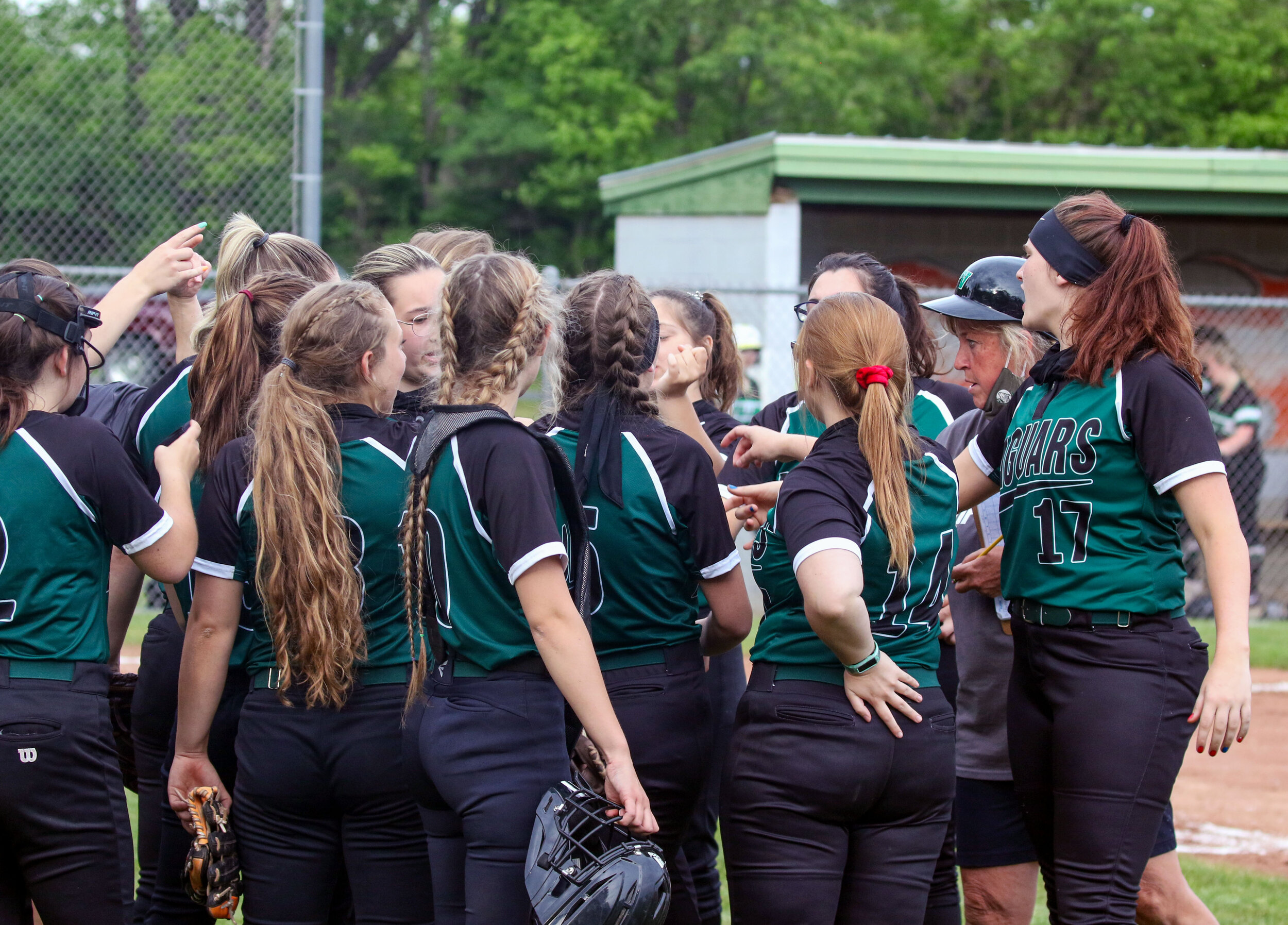  The Lady Jaguars of Genesee Valley break for their stand of defense on the field, led by their head coach Lisa Clark, second from right, during Tuesday night’s home contest against Fillmore. [Chris Brooks/WellsvilleSports.com] 