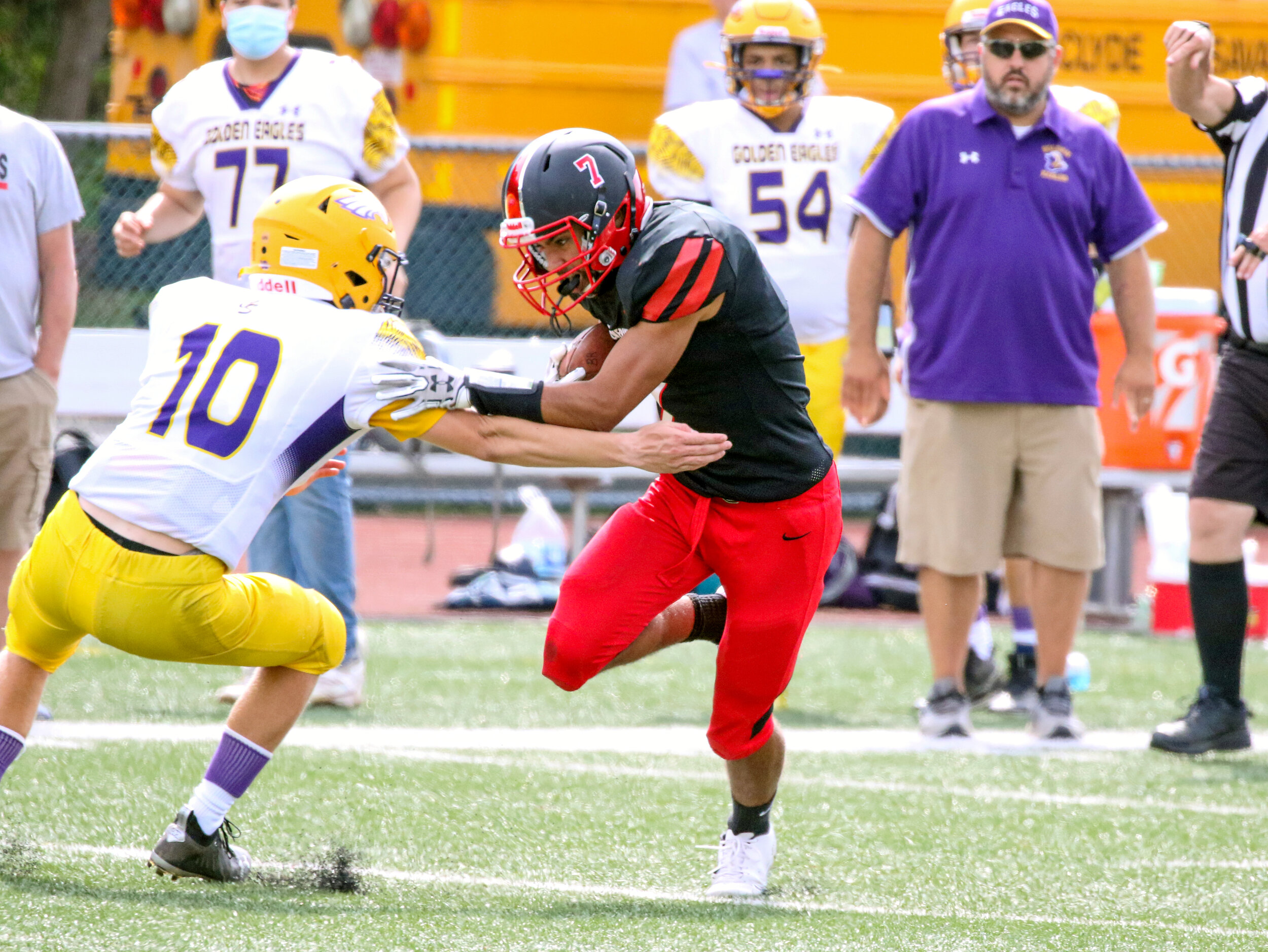  In this file photo, Bolivar-Richburg running back Rudy Polk (7) looks to work his way by the Clyde-Savannah defender on his way down the field during action earlier this season. Polk recorded a big night on the ground for the Wolverines on Friday, s