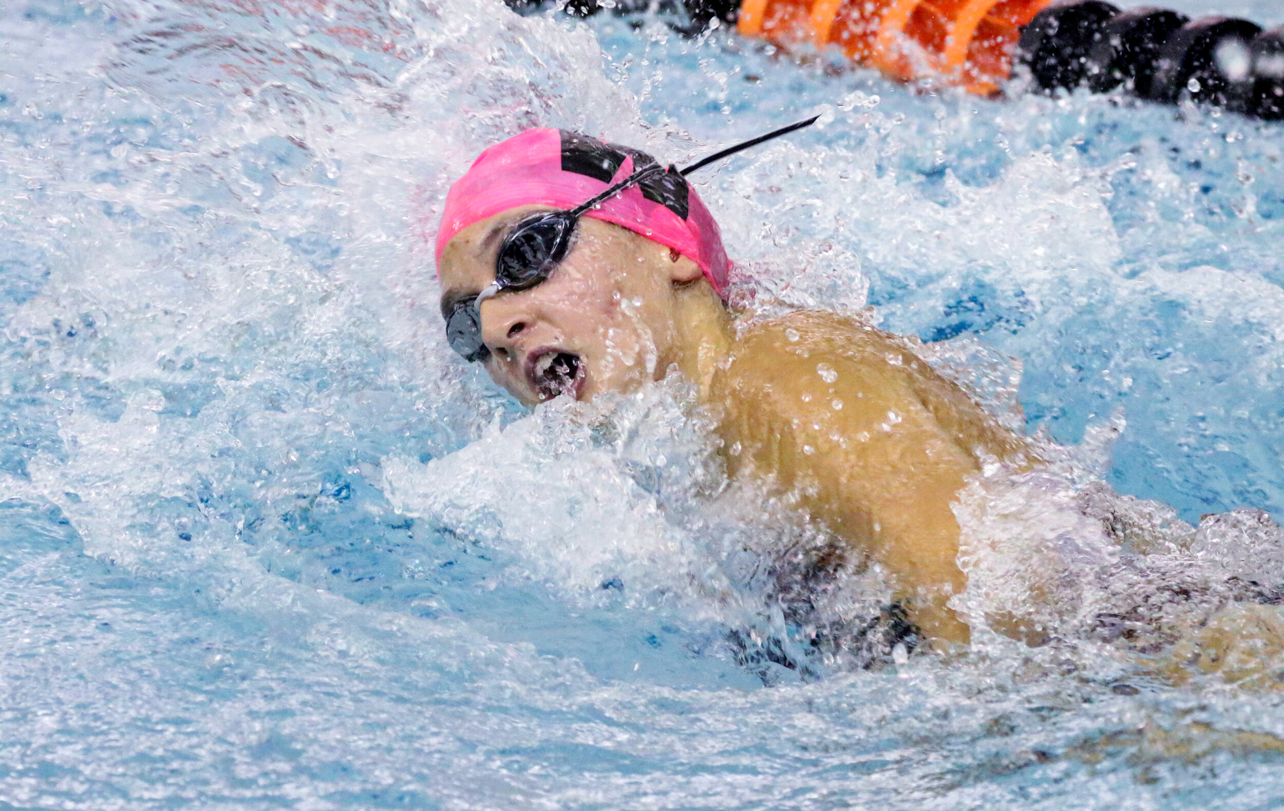  Wellsville’s Hayden Waldon comes up for air while competing in the 200 individual medley relay event of Saturday morning’s regular season finale against Hornell, in Wellsville. [Chris Brooks/WellsvilleSports.com] 