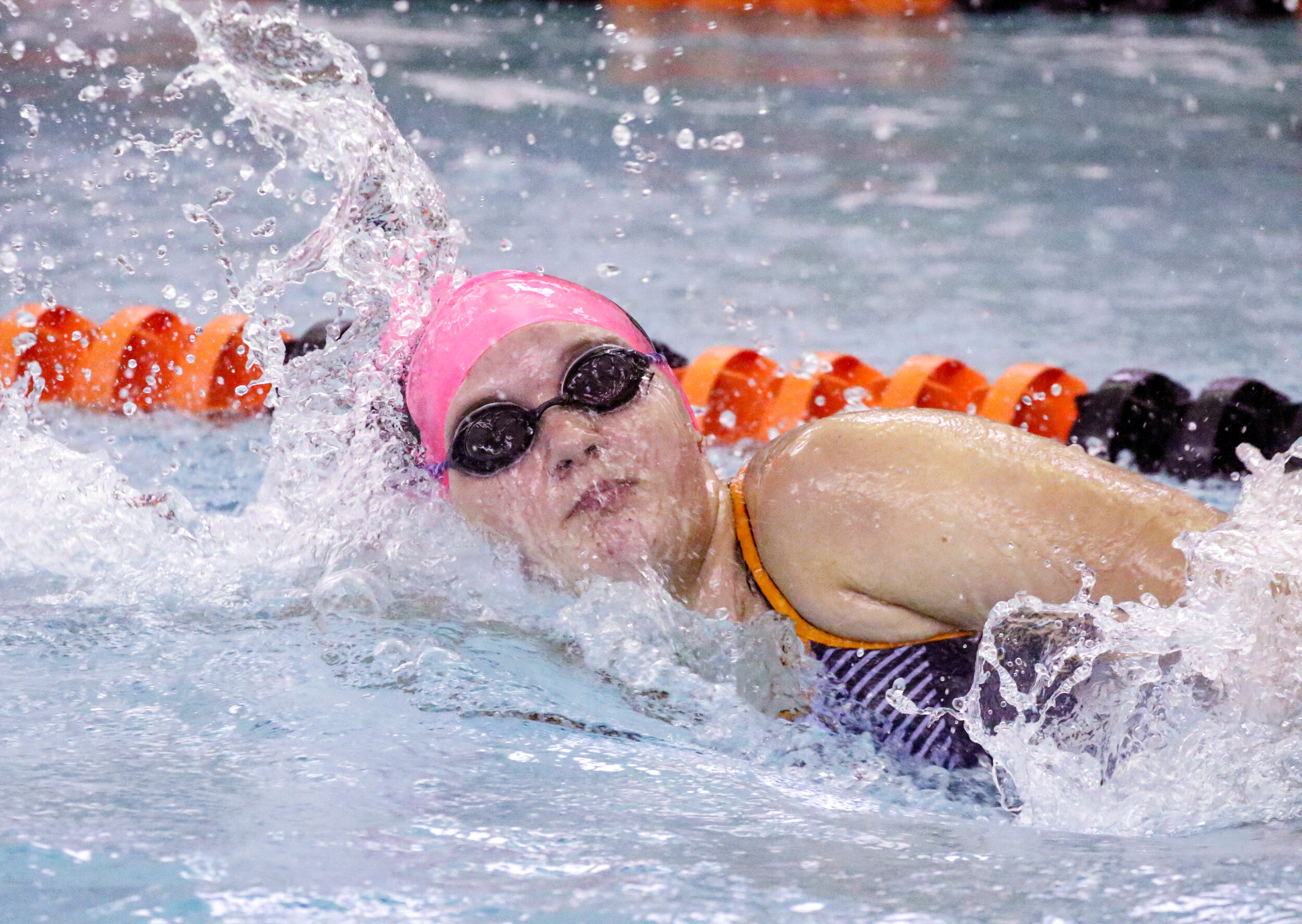  Wellsville’s Kaylee Oswald competes during the 50 freestyle event of Saturday morning’s regular season finale against Hornell, in Wellsville. [Chris Brooks/WellsvilleSports.com] 