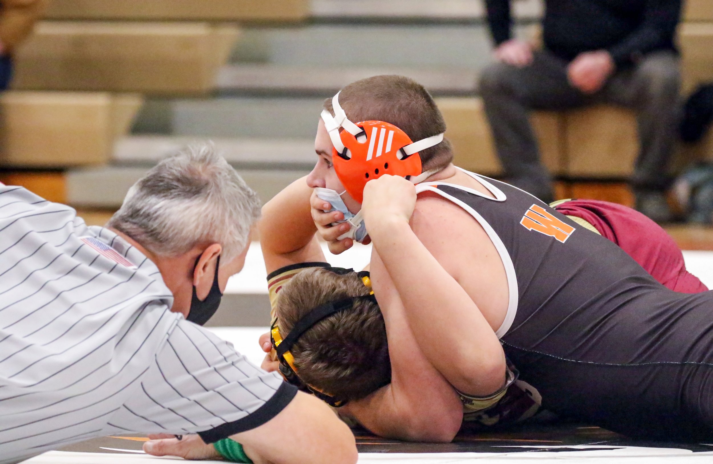  Wellsville’s Noah Black wraps up his opponent for the pin-fall victory during his bout at 215 pounds in Tuesday night’s home match against Avoca/Prattsburgh/Hammondsport. [Chris Brooks/WellsvilleSports.com] 