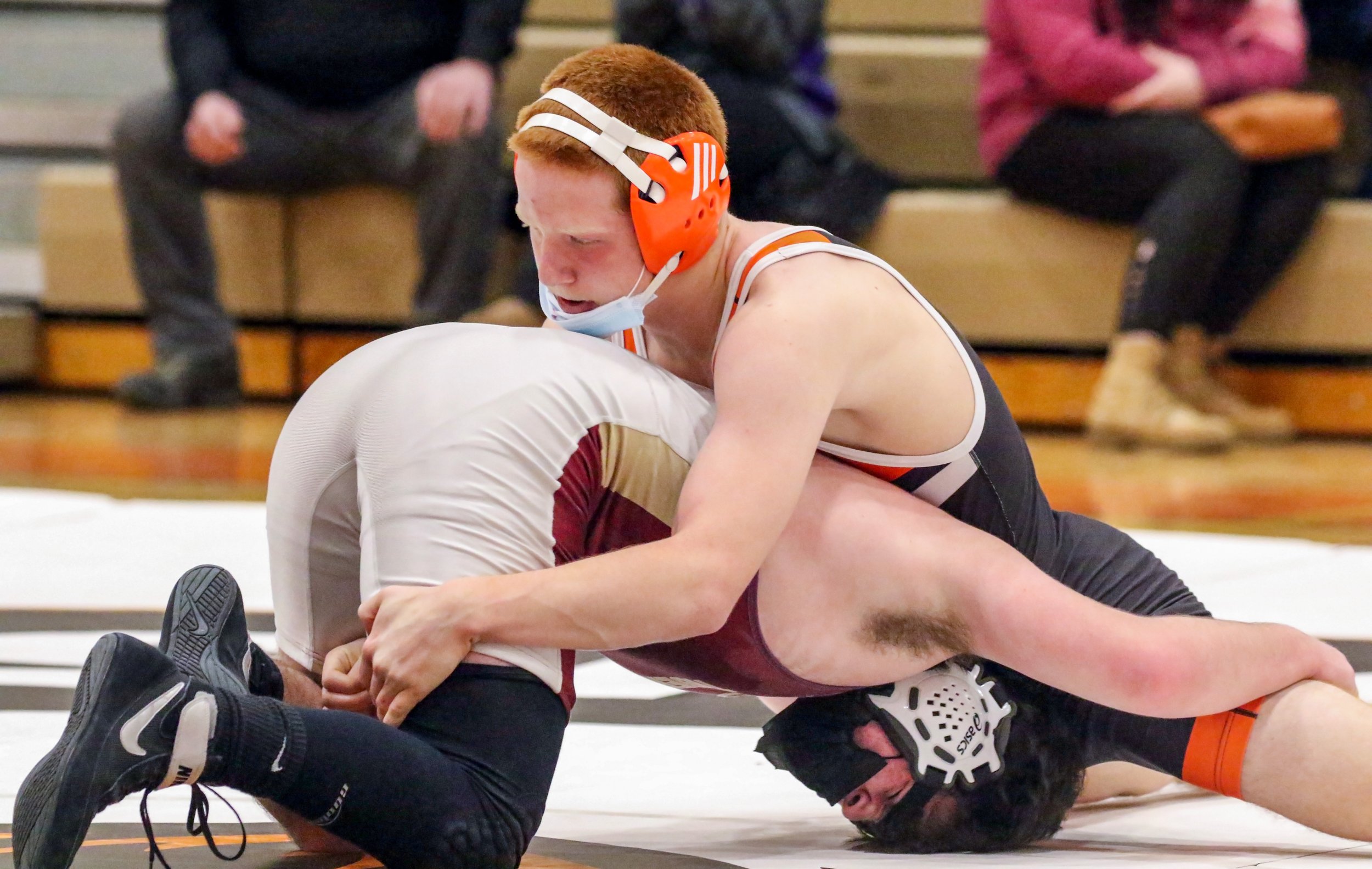  Wellsville’s Cole Hadfield, top, grapples with his opponent during his bout at 145 pounds in Tuesday night’s home match against Avoca/Prattsburgh/Hammondsport. [Chris Brooks/WellsvilleSports.com] 