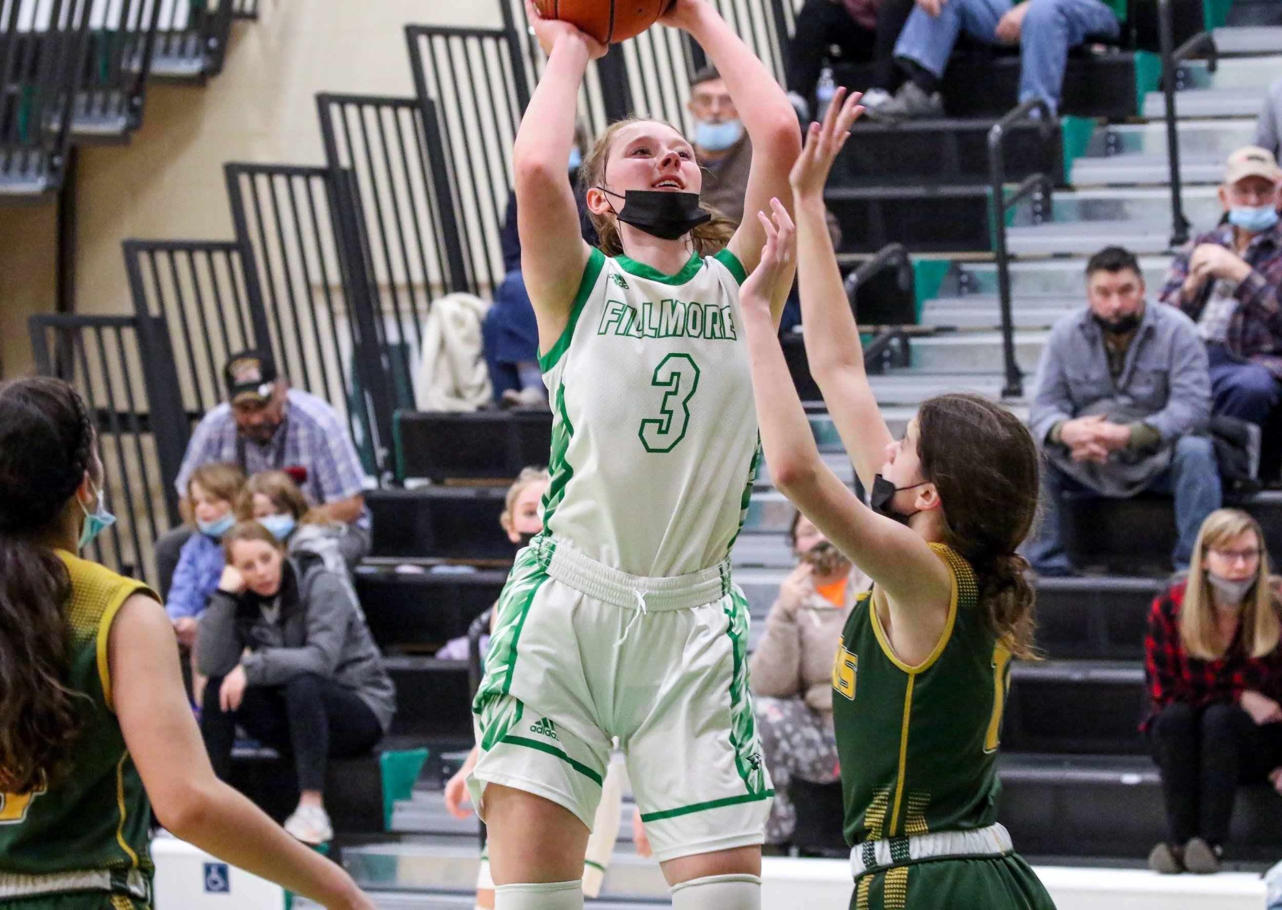  Fillmore senior Emma Cole (3) goes up for the basket while under pressure from the C.G. Finney defense inside the paint during Wednesday night’s home contest in Fillmore. [Chris Brooks/WellsvilleSports.com] 