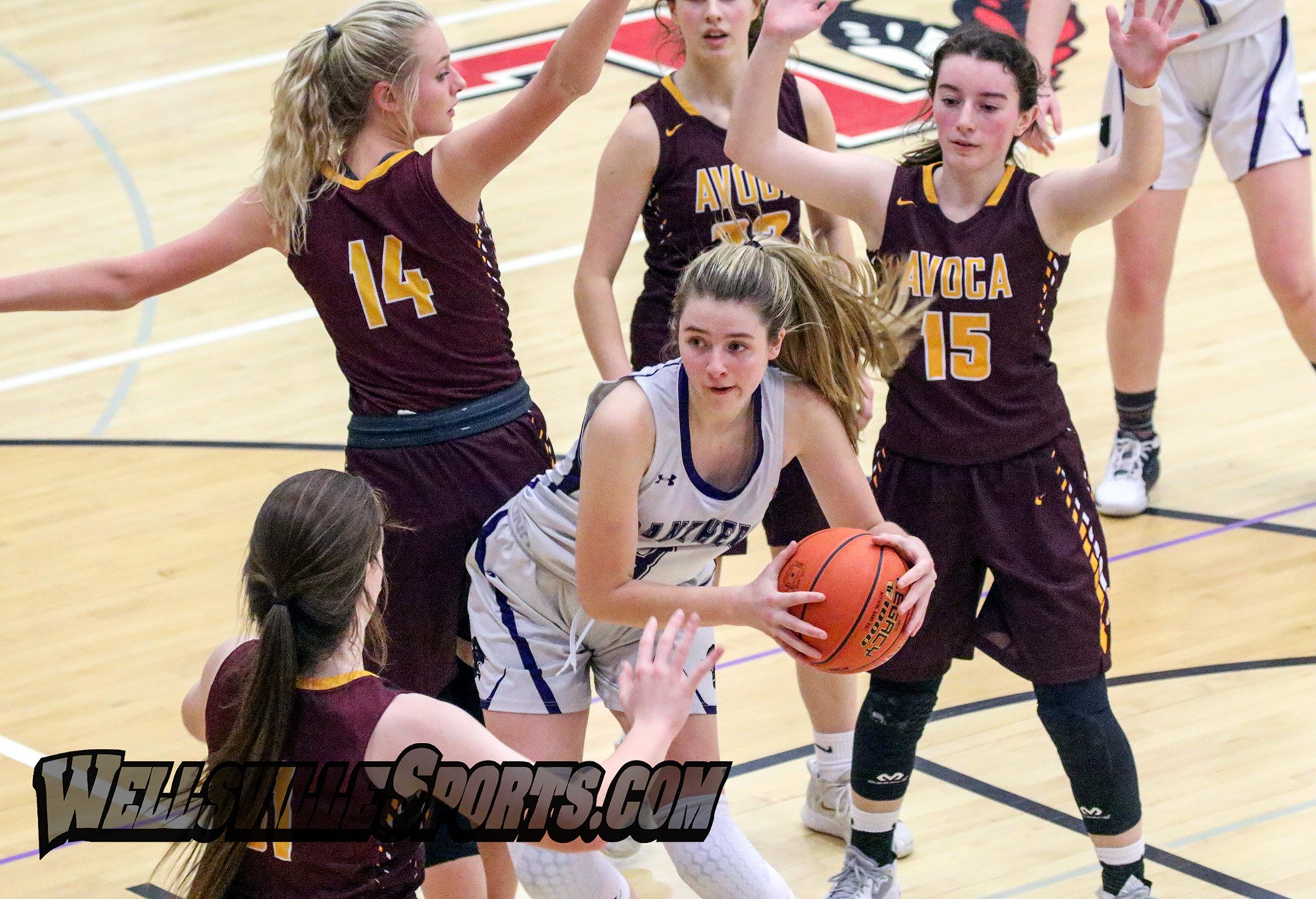  Andover/Whitesville junior Vanessa Hall (3) looks to  finesse her way around a slew of Avoca/Prattsburgh defenders on the way to the basket during Friday night’s Class D2 Finals at Letchworth. [Chris Brooks/WellsvilleSports.com] 
