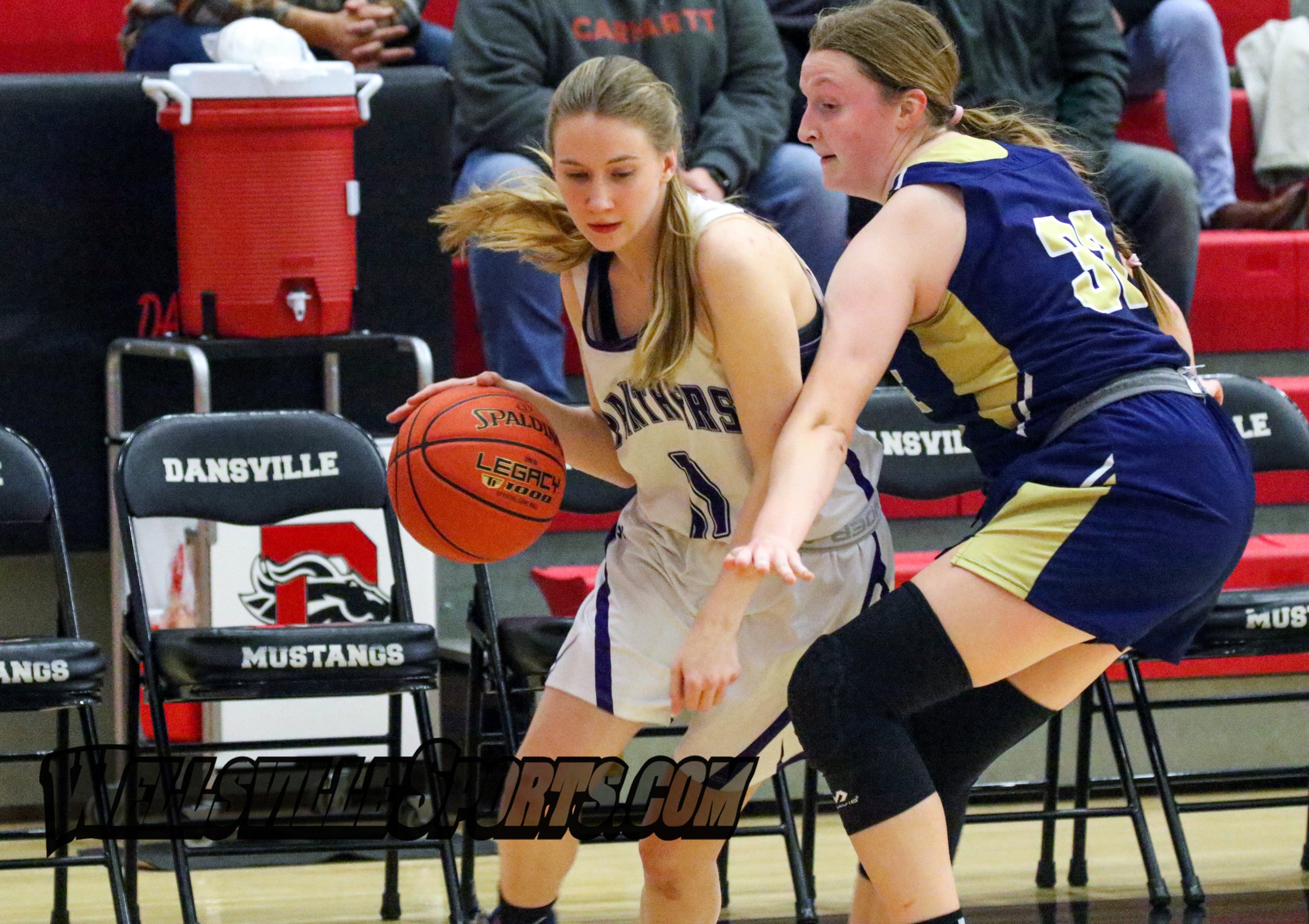  Andover/Whitesville senior Serena Ainsworth (11) looks to provide a drive inside while under pressure from the Notre Dame-Batavia defense during Monday’s Class D State Qualifier in Dansville. [Chris Brooks/WellsvilleSports.com] 