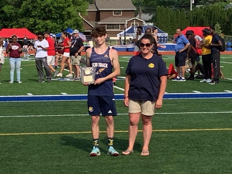  Scio’s Jordan White, left, is one of two Allegany County track stars that will make the trek west to partake in a State Championship battle in Middletown amongst the best of the best this weekend. Along with him, is head coach Brittany Canfield.  Wh