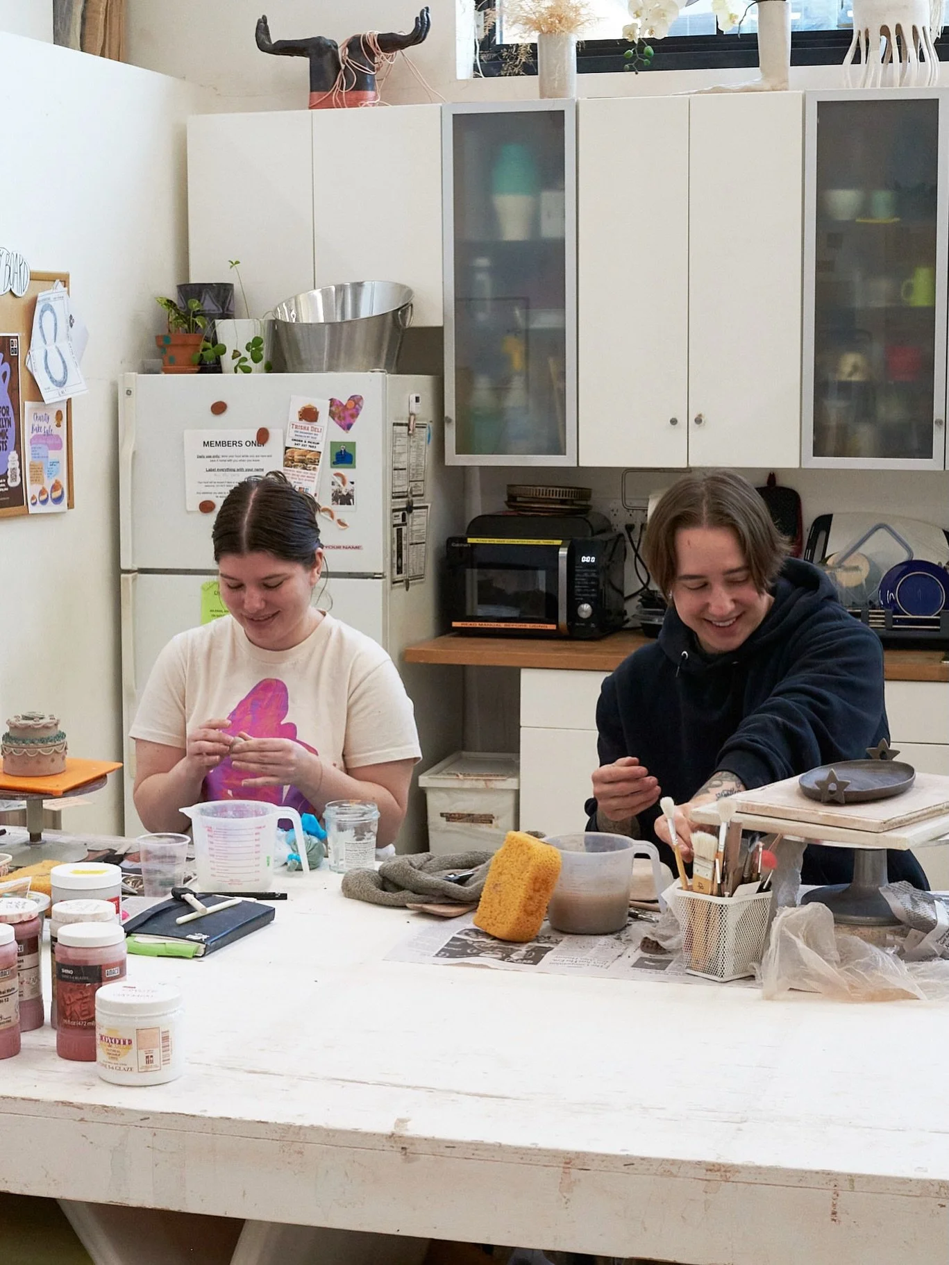 For this month&rsquo;s membership feature, we are excited to introduce you to Sacha Perlstein and Becca Carr, our handbuilding dynamic duo! Sacha and Becca sit next to each other almost everyday. With their opposite styles of pink and bubbly versus d