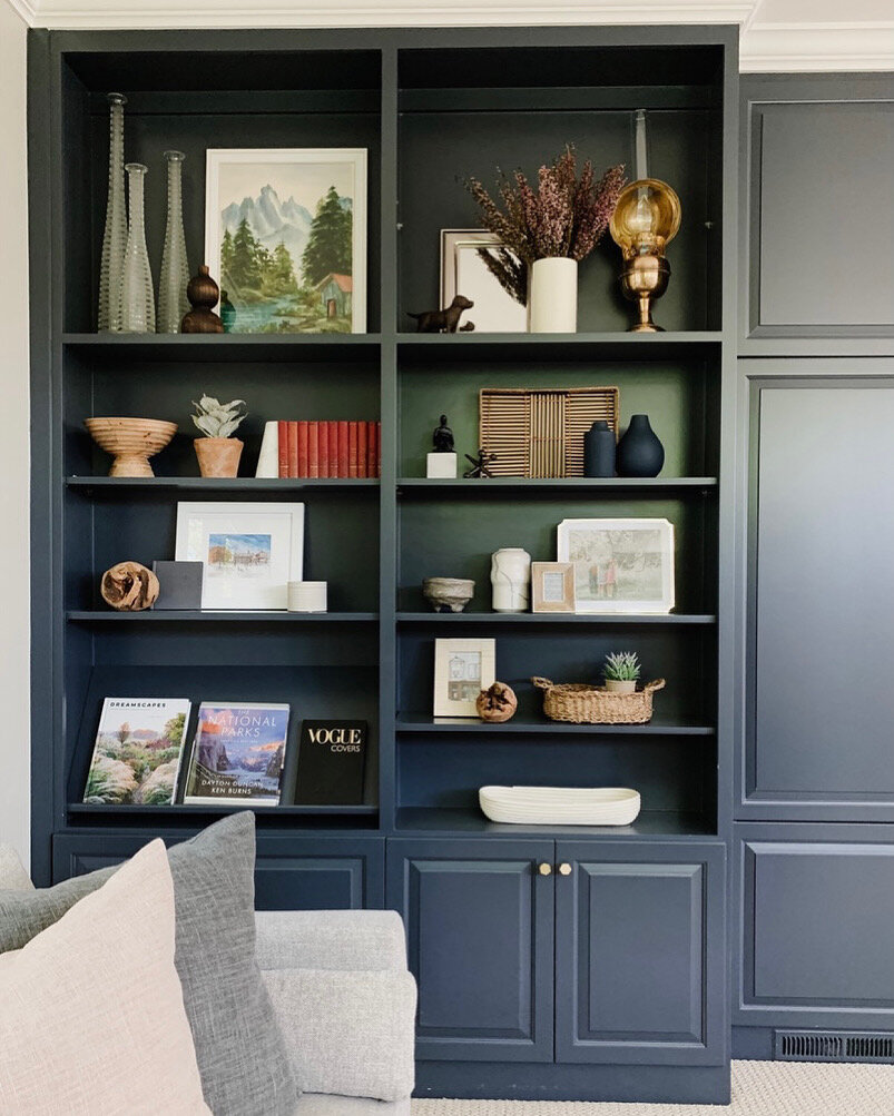 After_Photo_Built-in_Shelving_Accessory_Styling_with_Art_and_Family_Photos