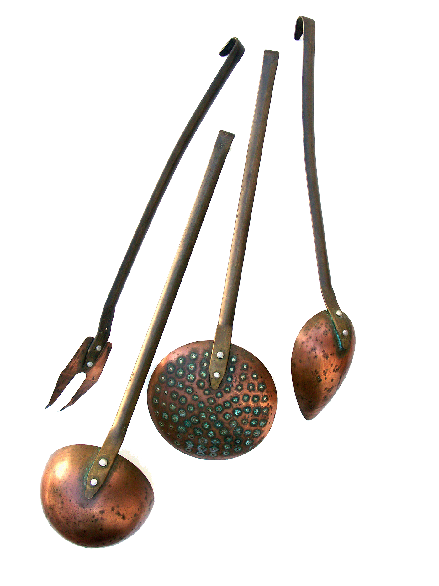 Set of three metallic tongs with copper handles and different functional ends, including a fork, a scoop, and a slotted spatula.