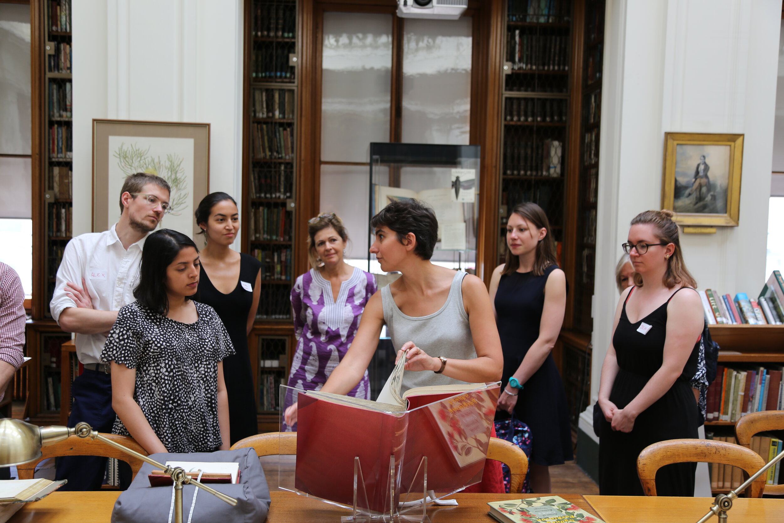 Head of Collections showcasing artworks in our Library.JPG