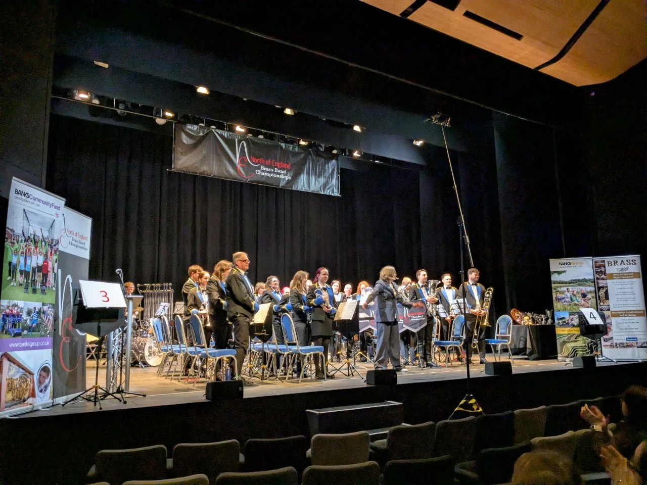 Ellie joins in the applause