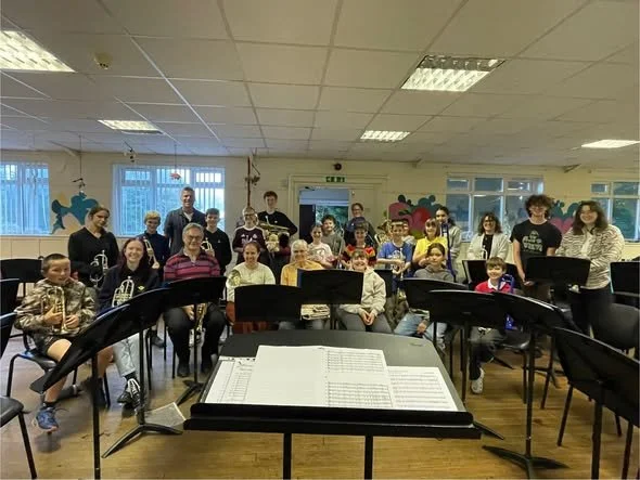 A visitor from Norway comes to conduct Brass Roots