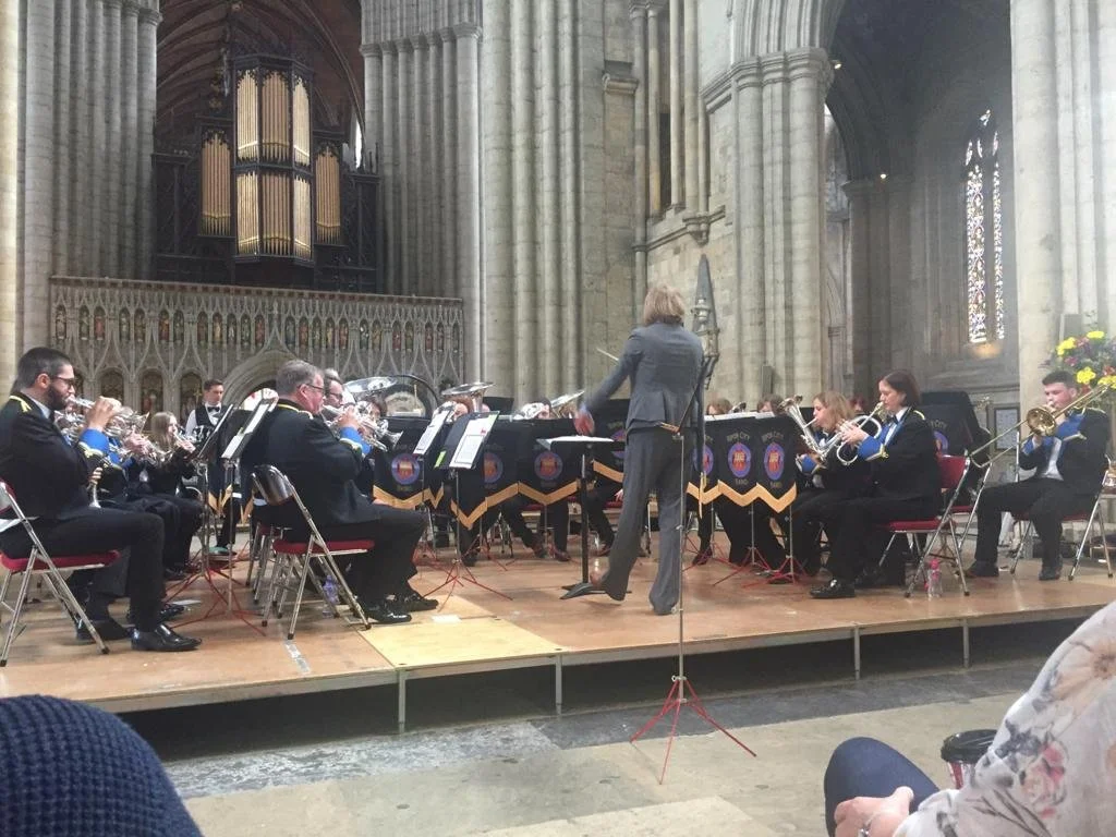 Band performing in a contest in a Cathedral.