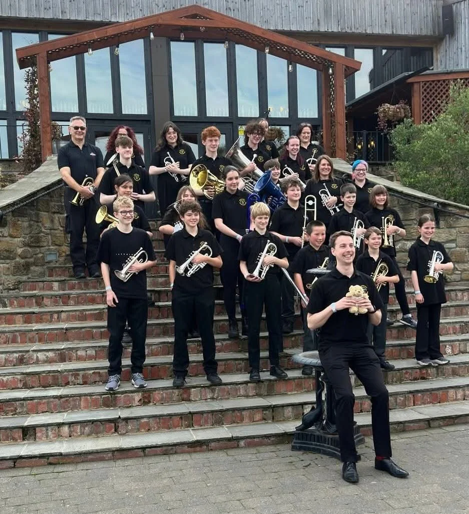 Ellie was really proud of Brass Roots's performance.