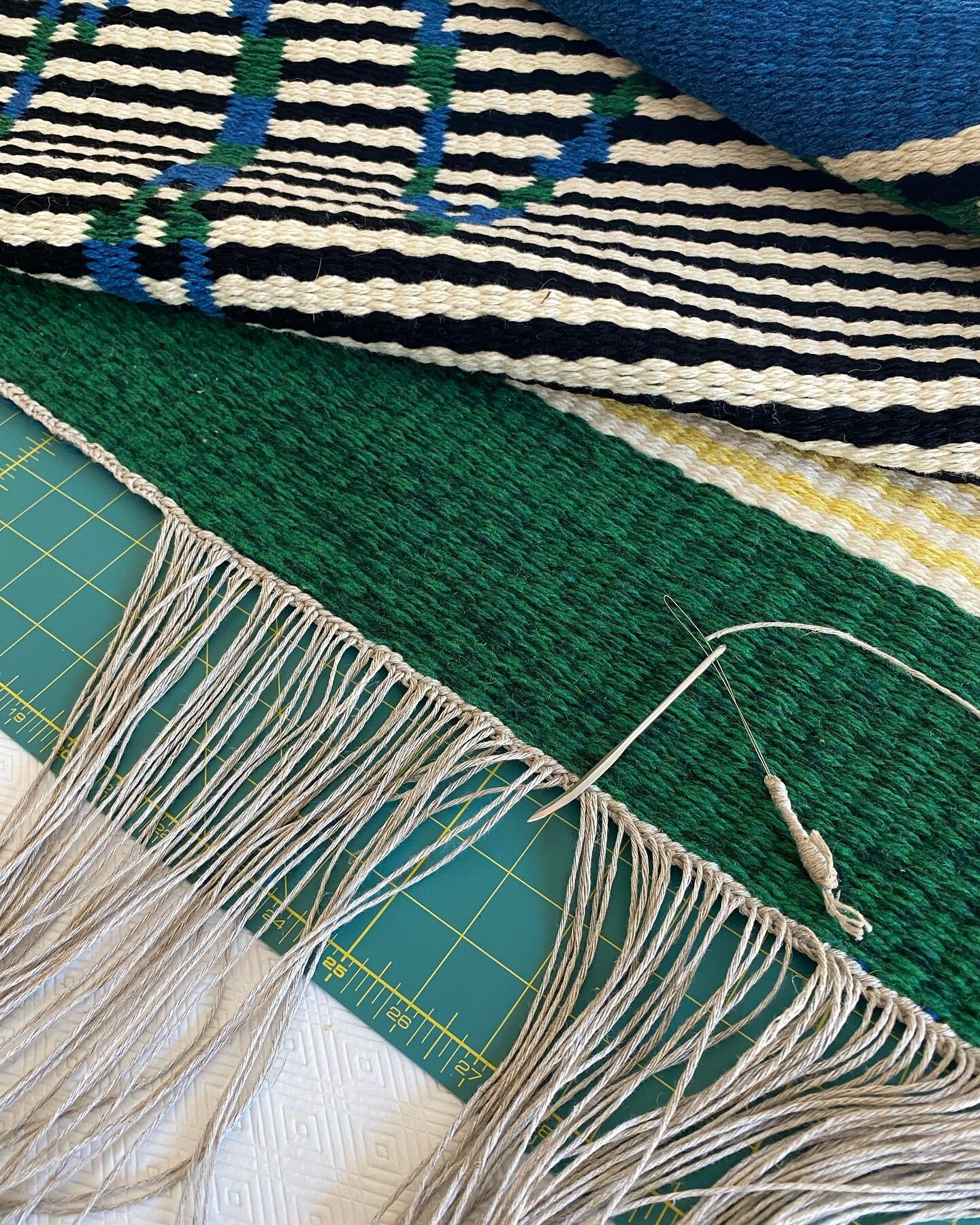 Finish work - weaving in the ends.  #browndogweaving #handwoventextiles #rugart