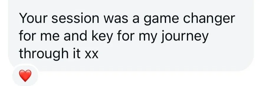 Text message to Sophia Eveline, a Reiki healer on the North Shore in Auckland: 'Your session was a game changer for me and key for my journey through it xx' with a red heart emoji.