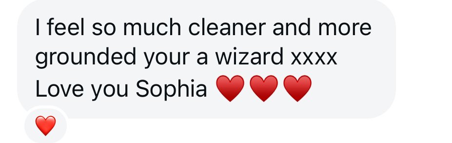 Text message with heartfelt message expressing gratitude for distance Reiki healing with Sophia Eveline, and red heart emojis for emphasis.