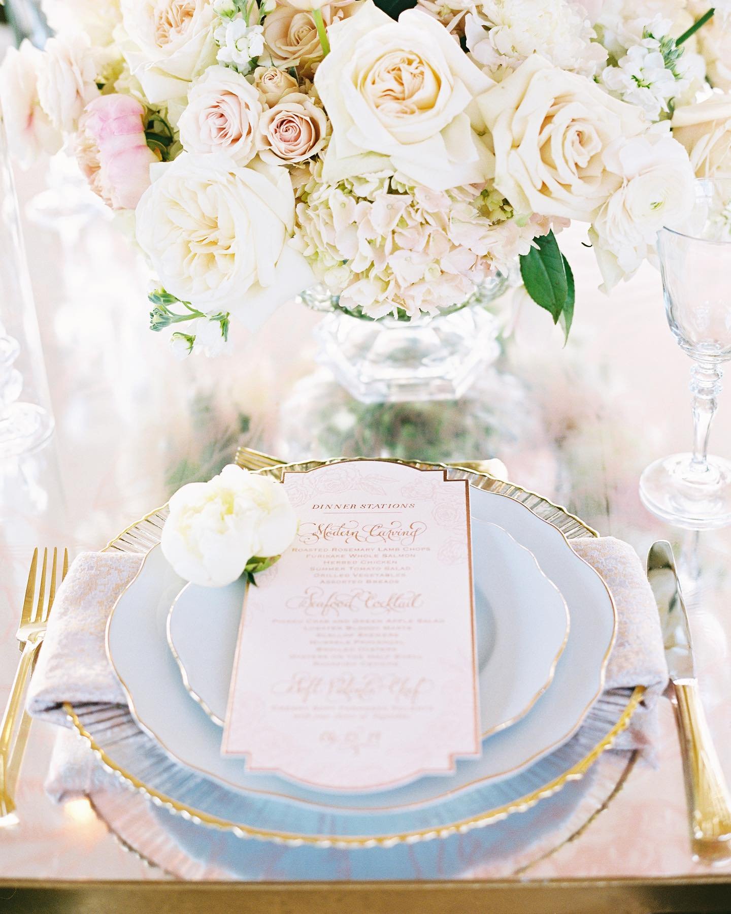 Wow! Talk about a beautiful table setting with a custom rose gold and blush letterpress menu ✨ Swipe to see the full shot of this gorgeous reception dinner designed by the talented @laurynprattes 

Amazing Vendors:
Planning &amp; Design: Lauryn Pratt