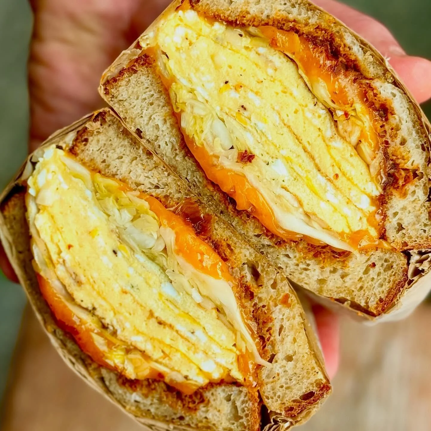 Good morning ☀️ Enjoy your day, super excited to see you ✨
The All-Day Egg Sandwich (winter version): 
Bodega Eggs, Pasilla Salsa, Kraut, Cheddar, Toasted Levain 🙌