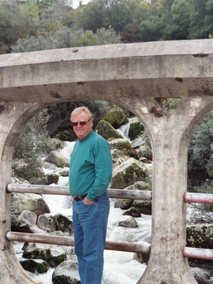 Edmund Lambert on a bridge in Portugal.png
