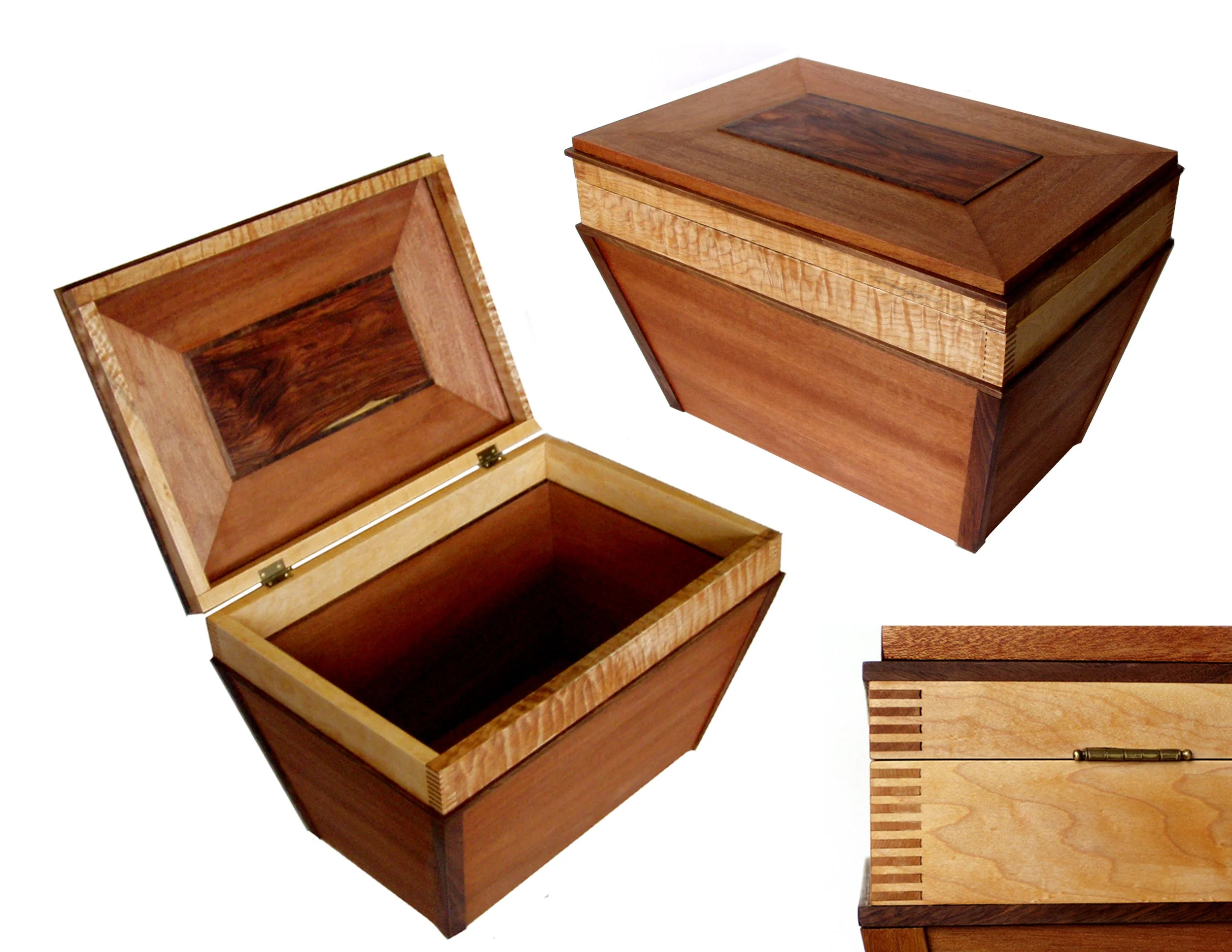  Mahogany box with a floating Rosewood center panel and Quilted Maple and Walnut trim.  