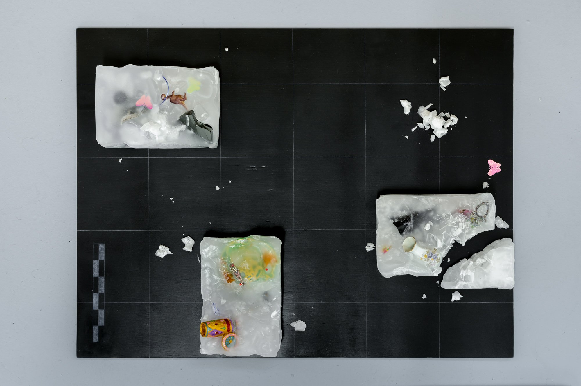   site (disarray) , 2022   Plywood board, paraffin wax, pencil, baking tray, various found objects. Base measures 60 x 80 cms.    