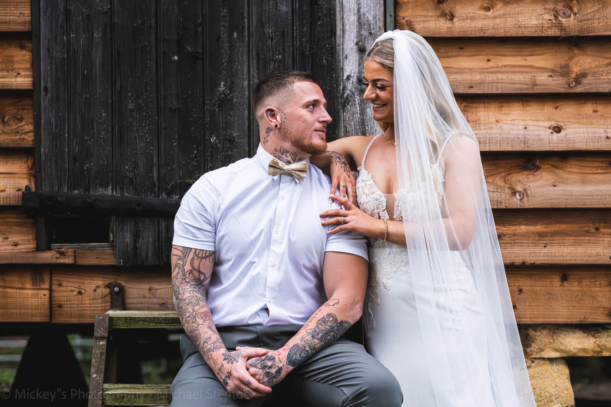 Bride and groom look at each other lovingly!