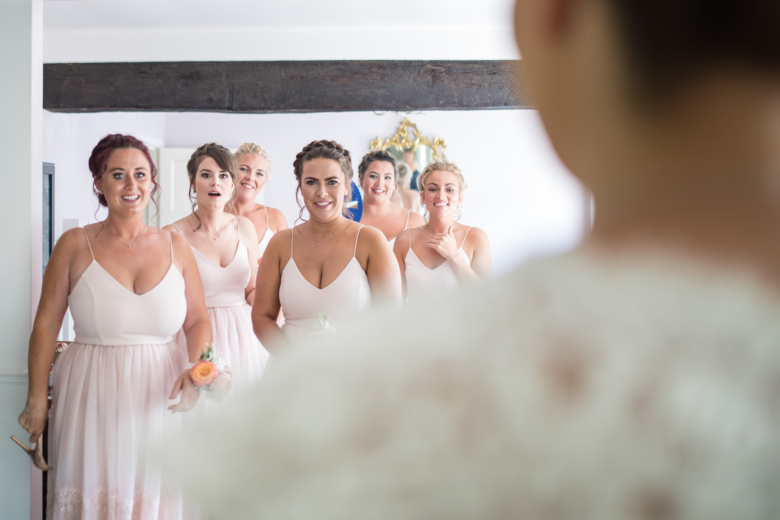 bride-and-bridemaids-surprised.jpg