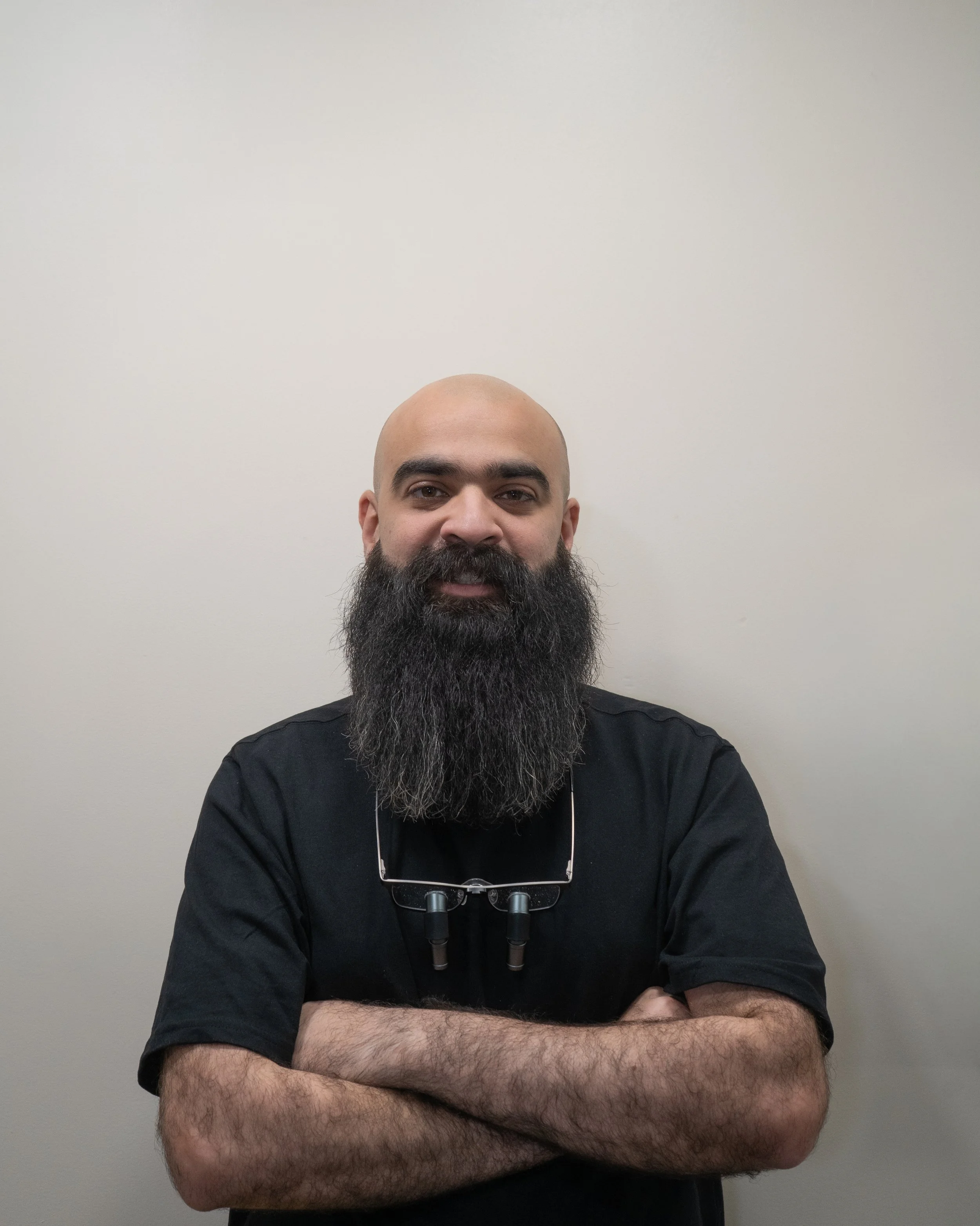 Dr. Omar Aamir Aziz, dentist at the clinic.