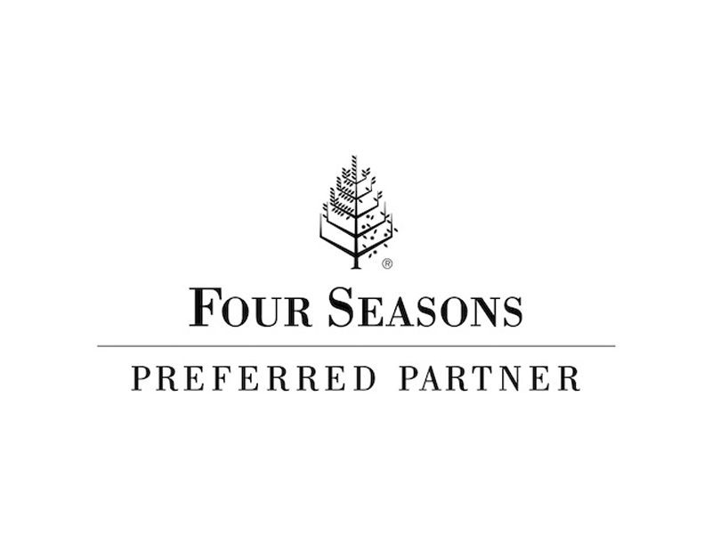 Four Seasons Preferred Partner logo with a stylized tree and text