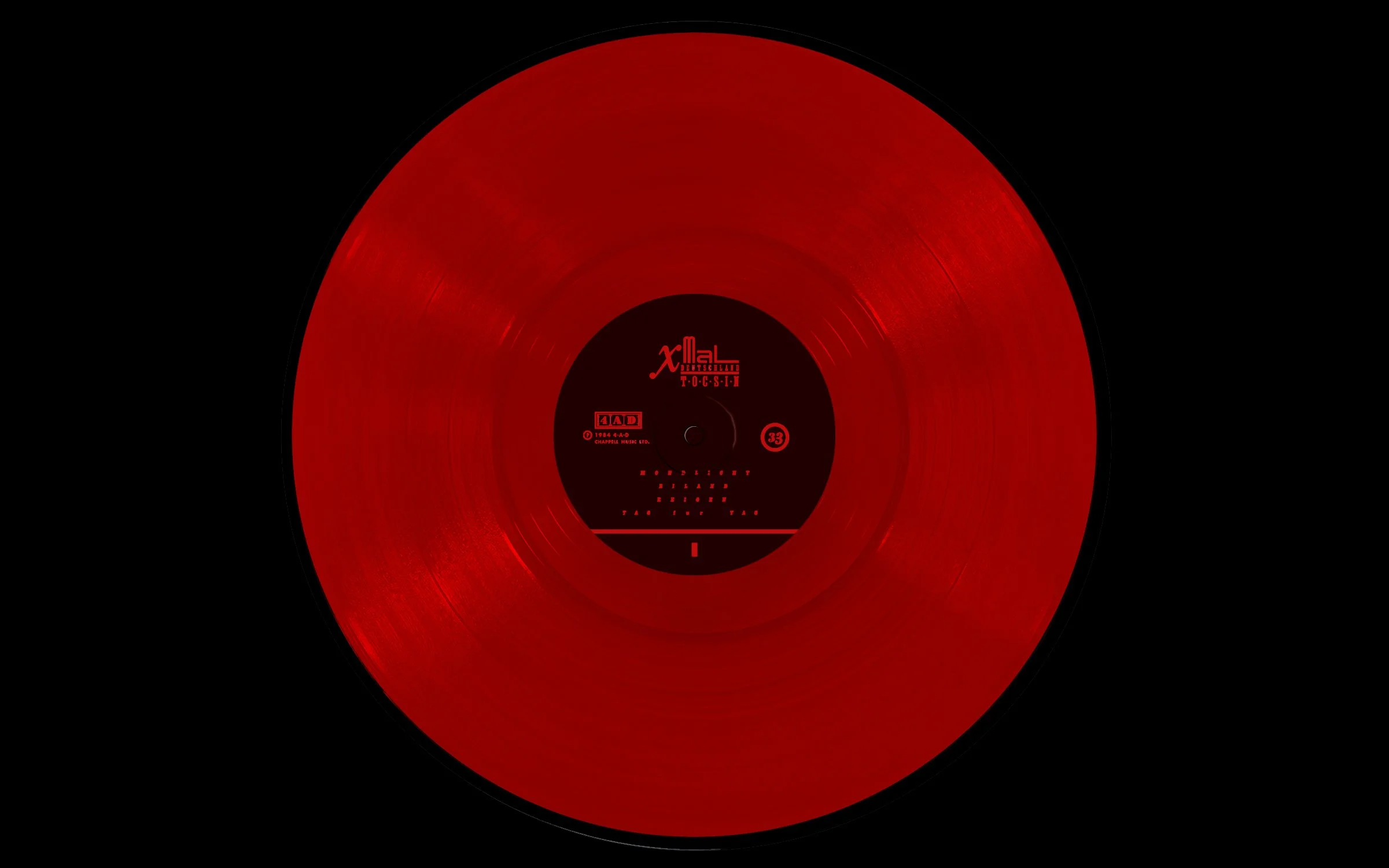 LP2 Vinyl. Similarly to the LP cover treatment, each label replicates Vaughan Oliver's original design but again translates it into red and black to tie the set together.