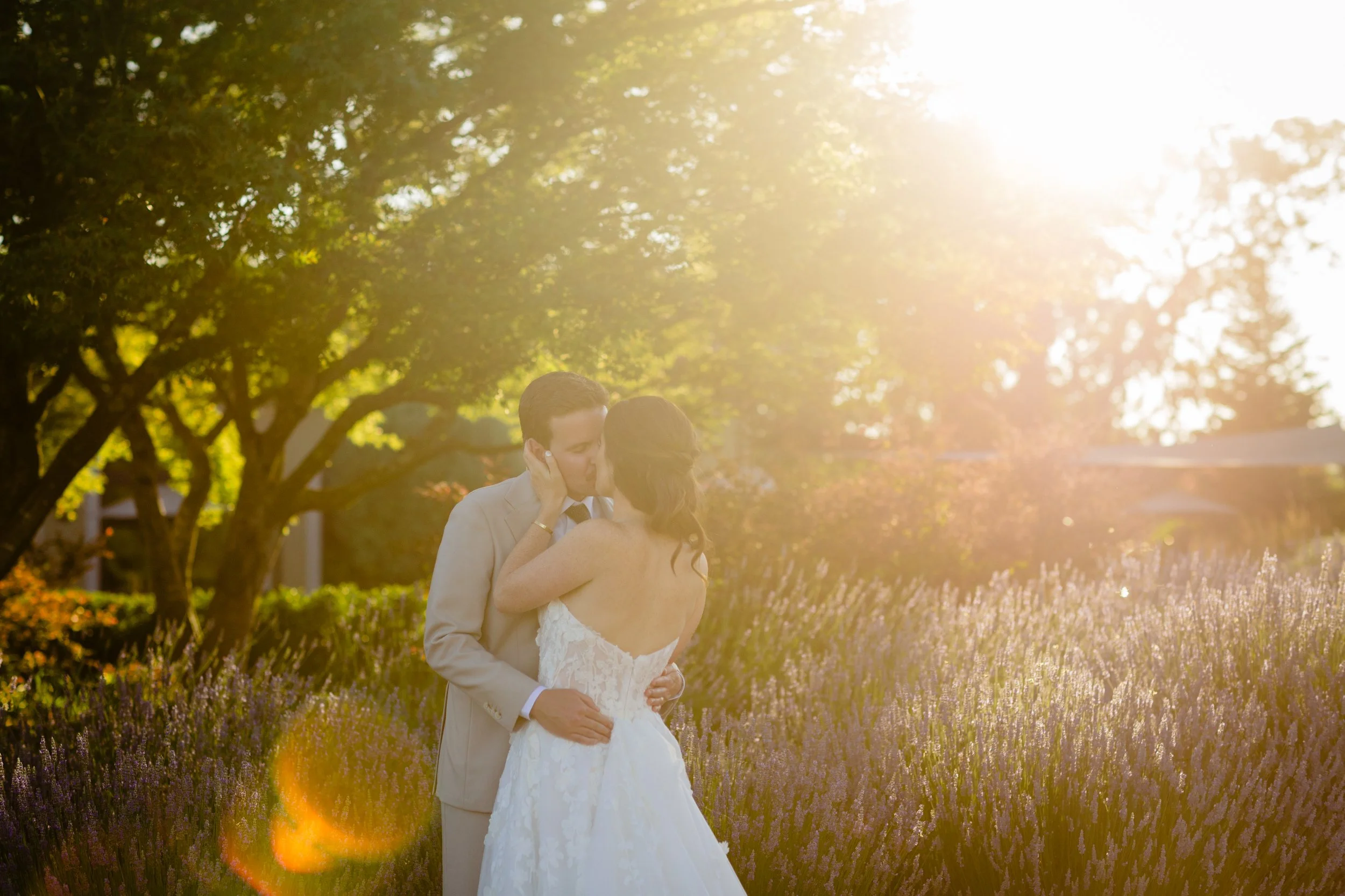 The perfect golden hour shot of a newlywed couple taken by the best Austin wedding photographer