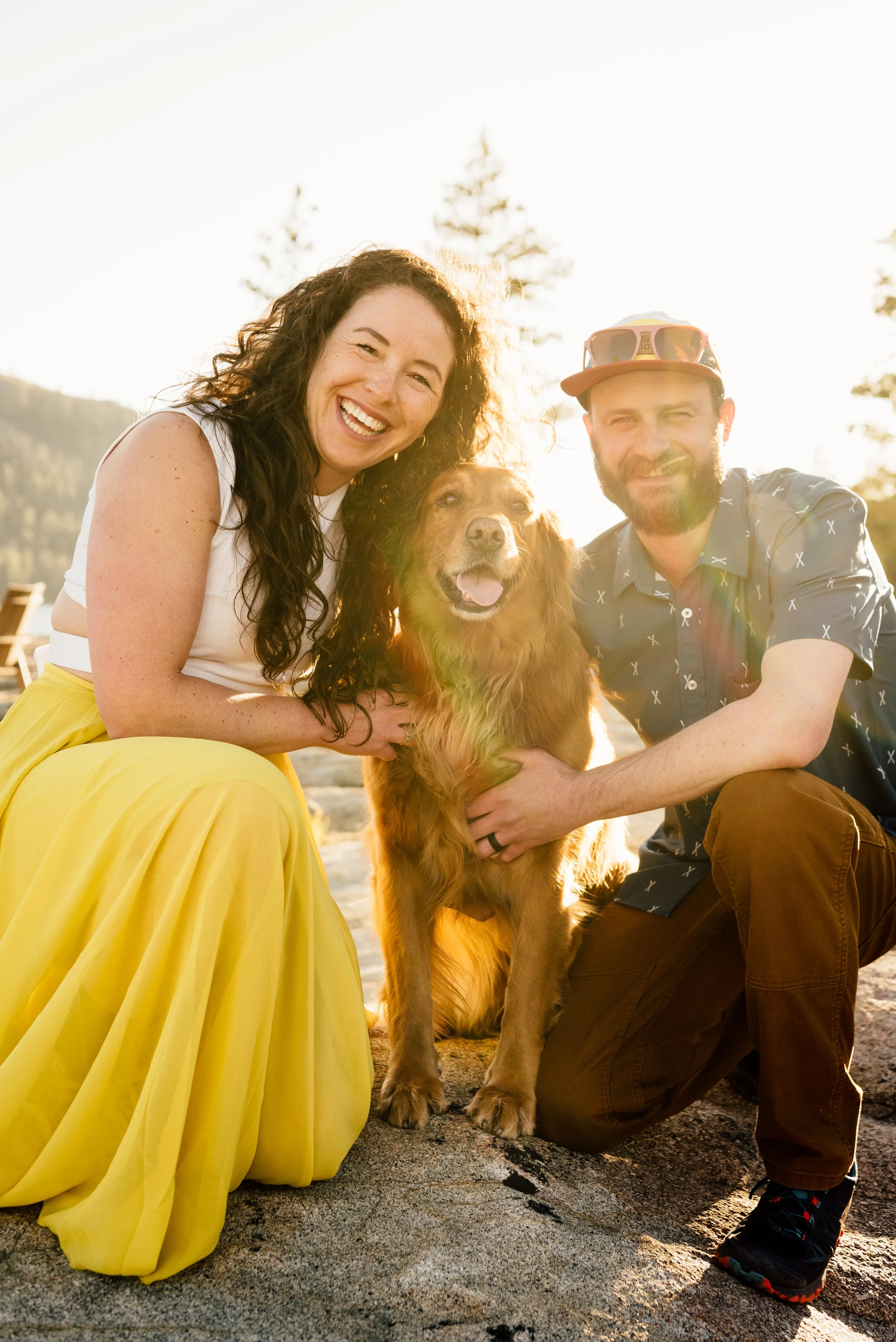  Couple with dog at golden hour 
