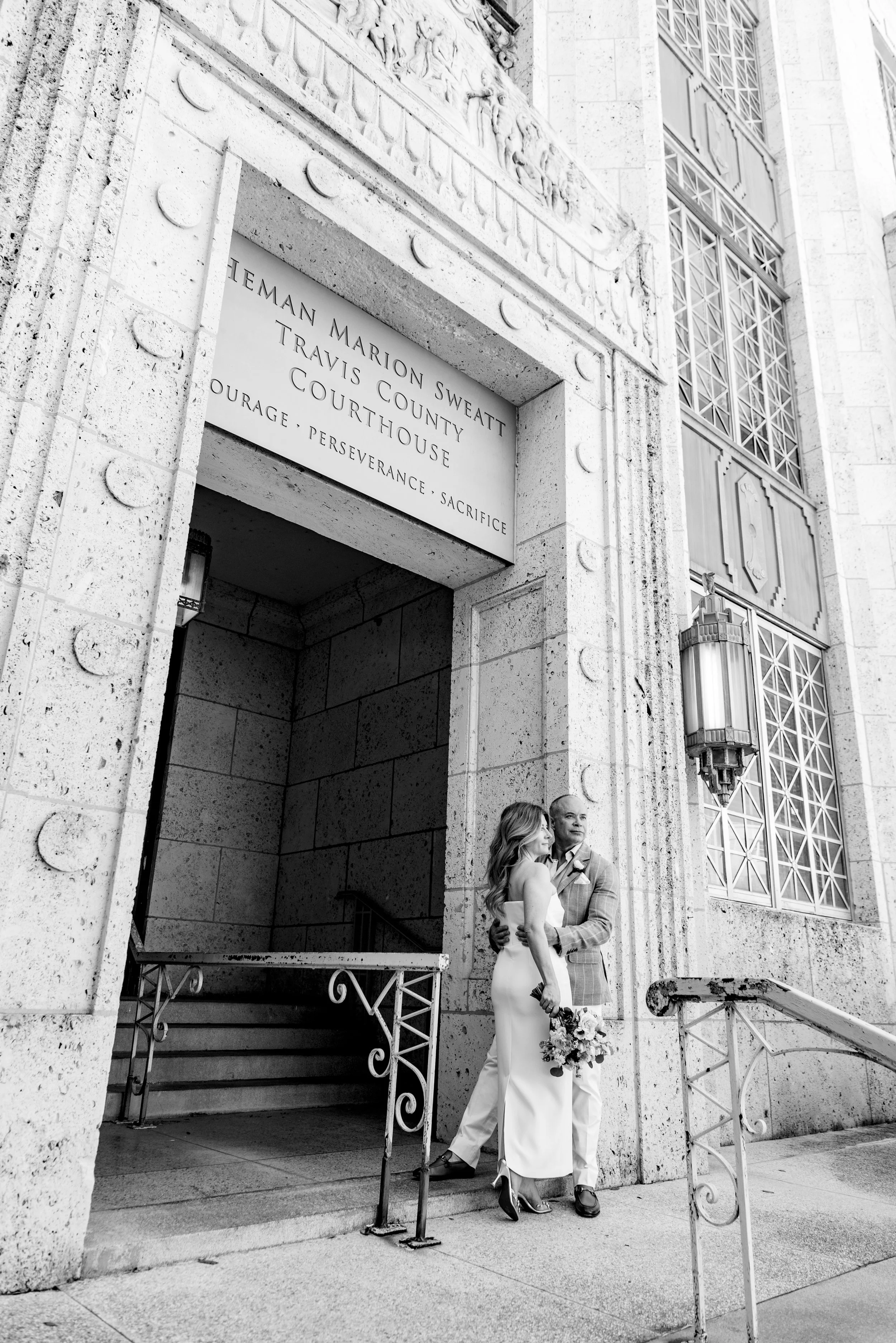 Black and white image of newlyweds just getting eloped in Austin