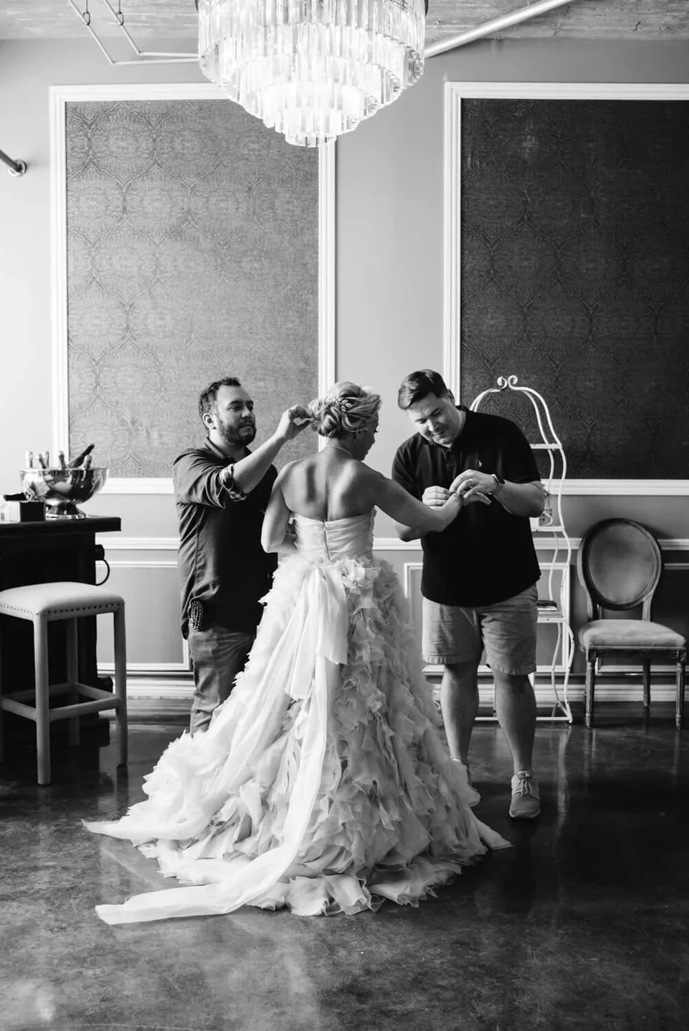 Hair and makeup team getting bride ready