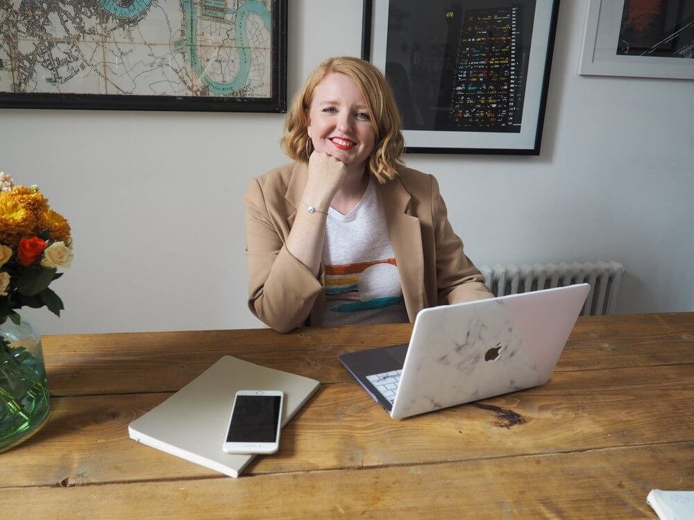 big thinking professional woman happy with a great website that highlights her expertise