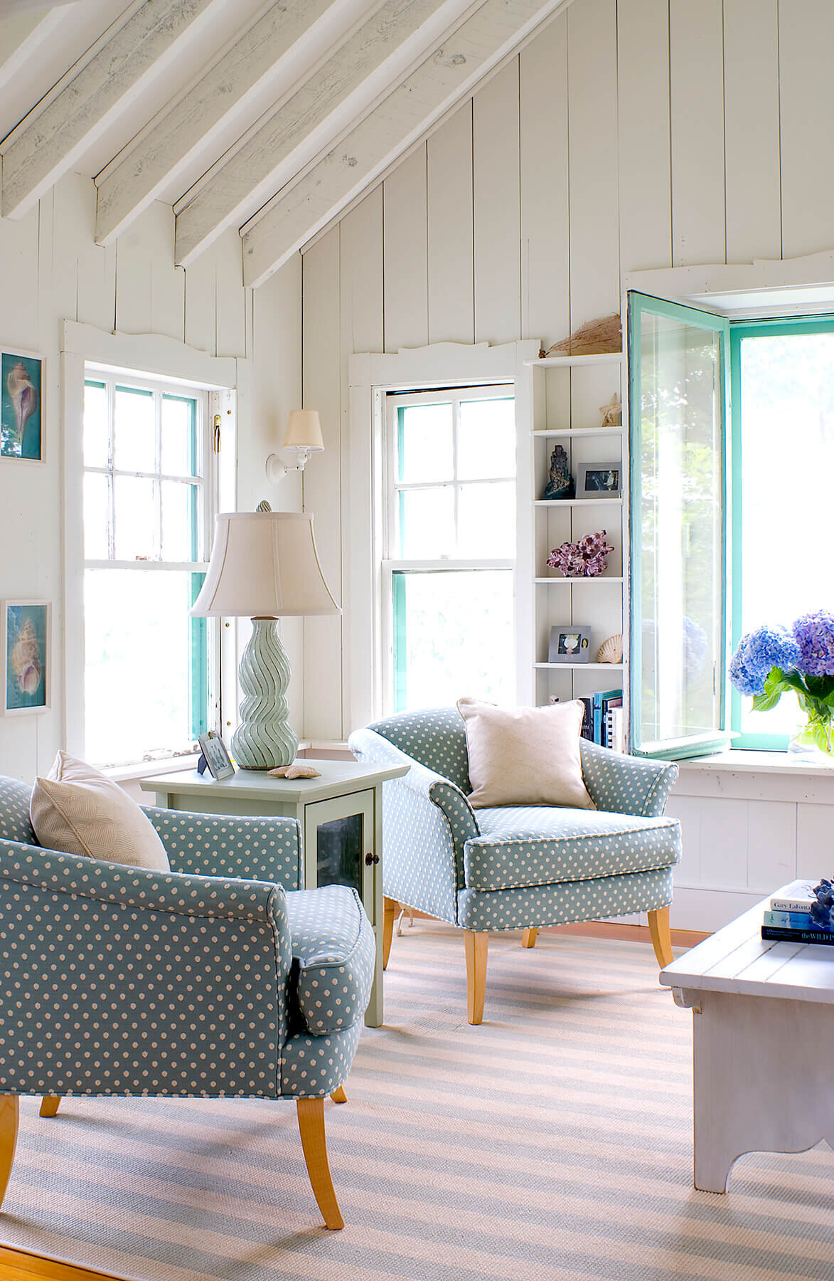 Coastal interior living room in blue and white.