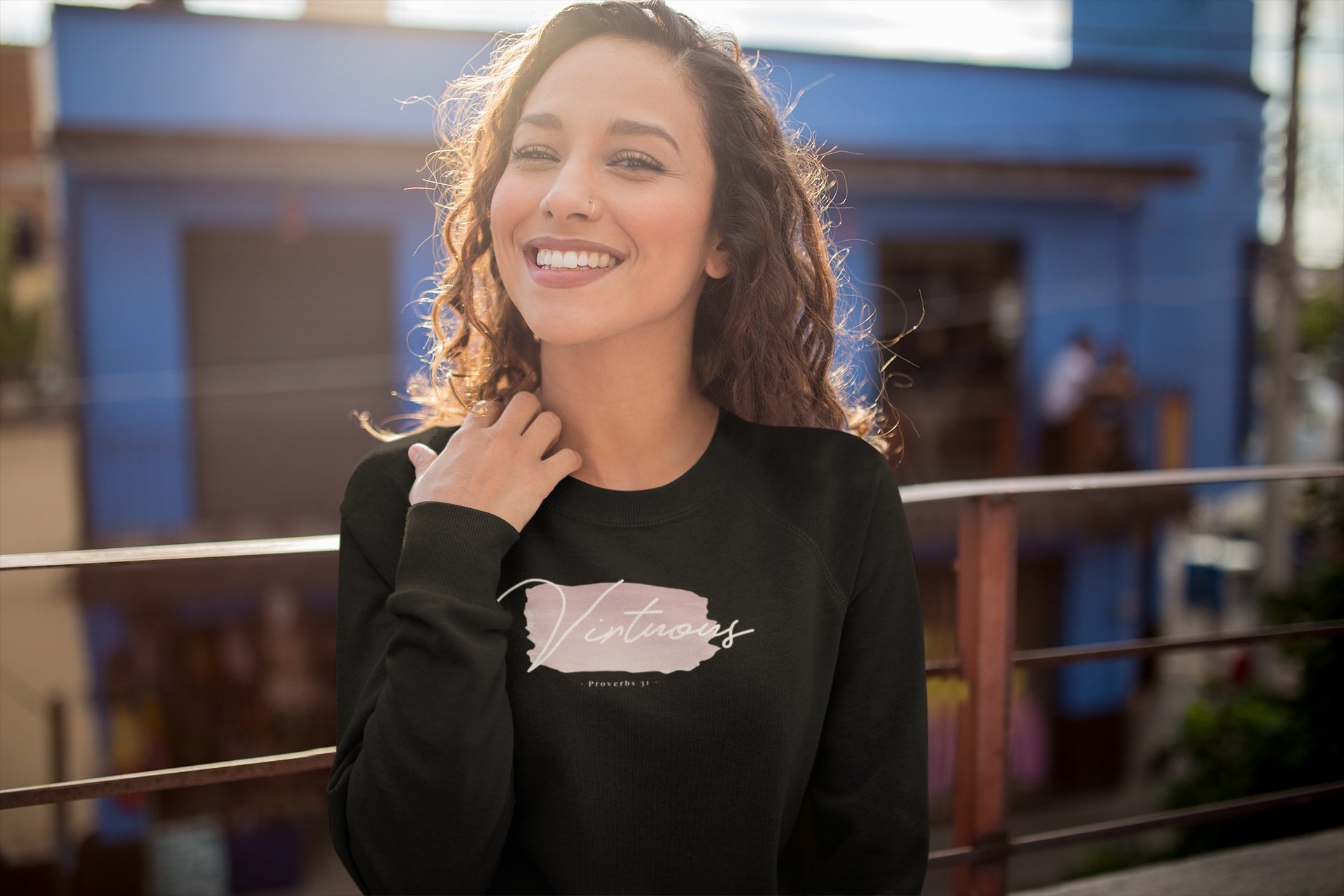 sweatshirt-mockup-of-a-happy-woman-on-a-balcony-22290.jpg