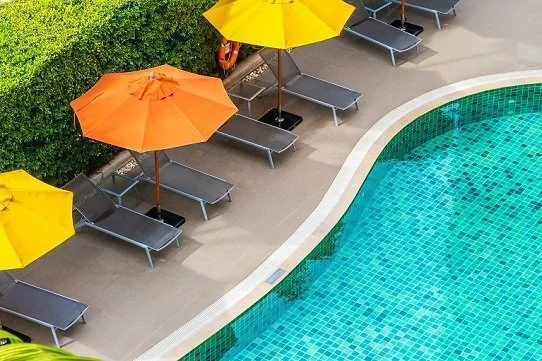 Create a Relaxing Space in Your Backyard with Elegant Pool Chairs
