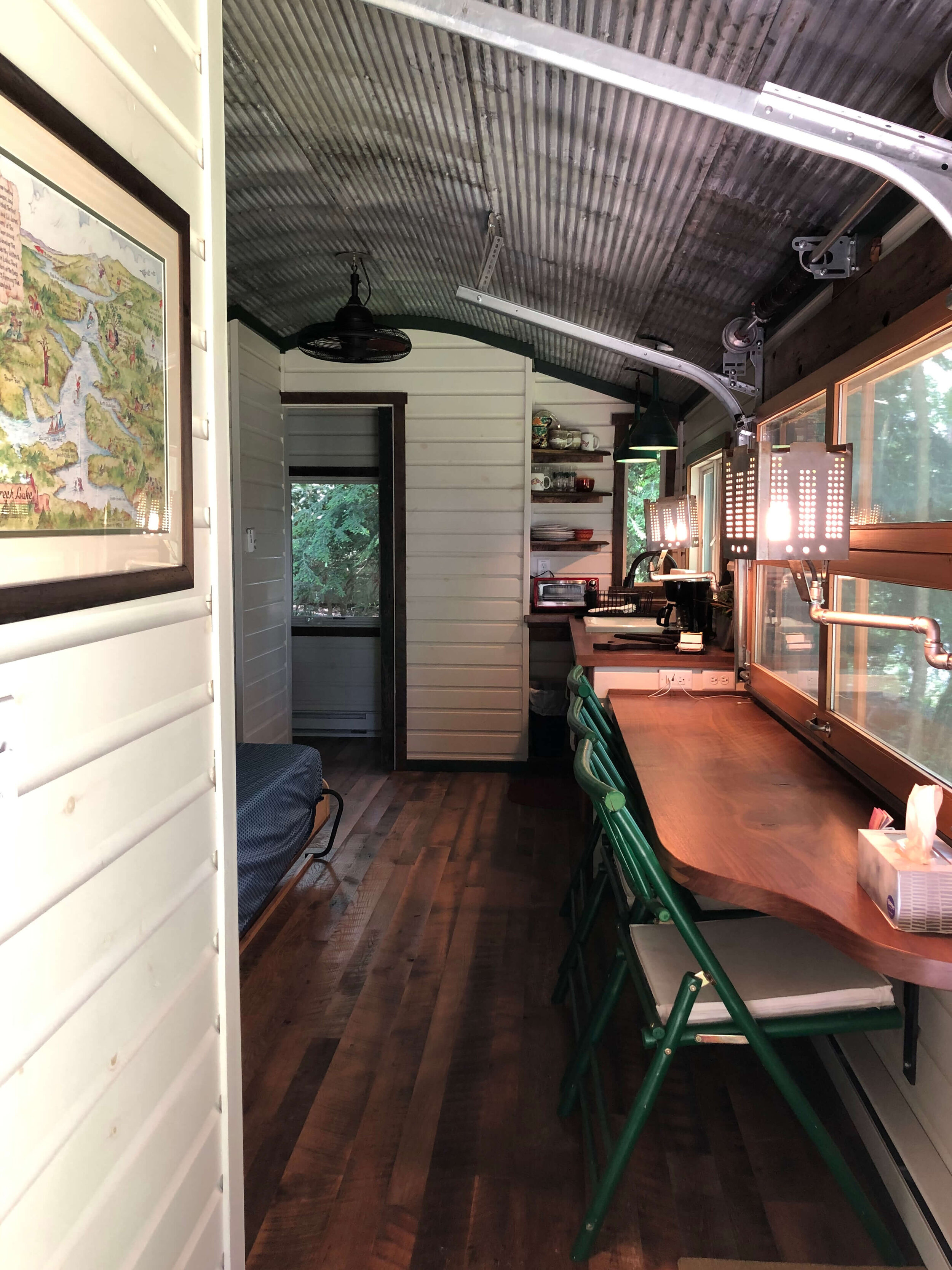  The kitchen in this tiny house is suited more for those that wish to have guests stay with them. 