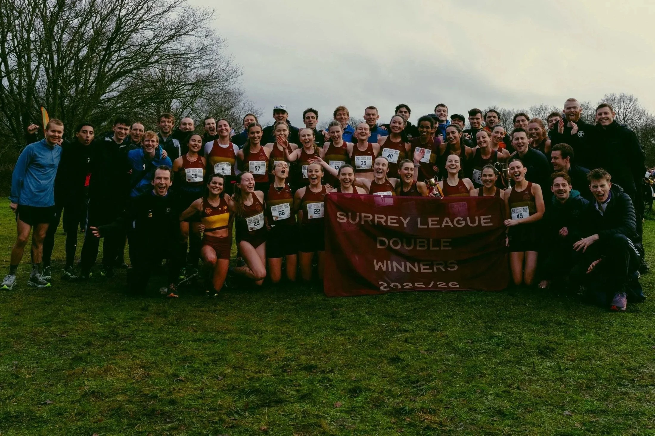 Belgrave Harriers men's and women's teams celebrating their Surrey League double on Wimbledon Common.jpg