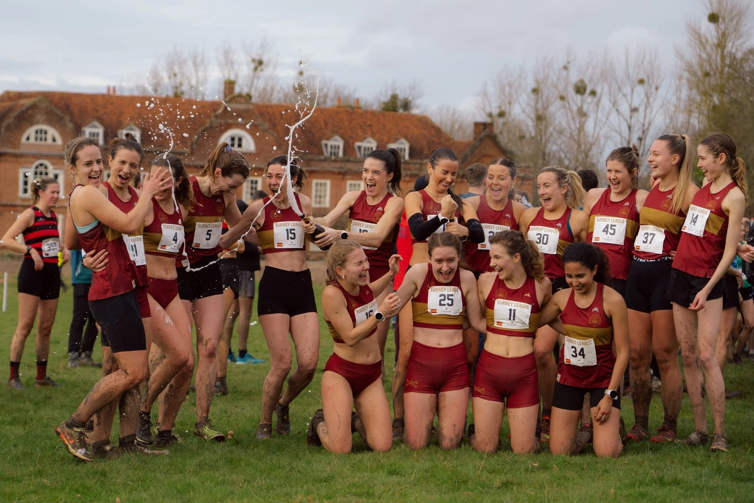 Belgrave women celebrating together at a Surrey League cross country race.jpg
