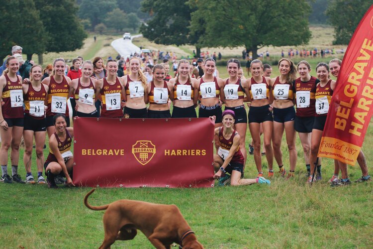 l-r: Lizzie Goldie-Scot, Sarah Dewhirst, Alix Vermuelen, Sophie Cowper, Lydia Barnett, Laurel Bray, Lea Adamson, Bethan Goddard, Mimi Corden-Lloyd, Steph Hewitt, Grace Richardson, Liv Papaioannou, Jojo Rhodes, Beth Evans, Emily Bannister. Front row l-r: Jane Vongvorachoti, Sam Amend. Foreground: Dog.