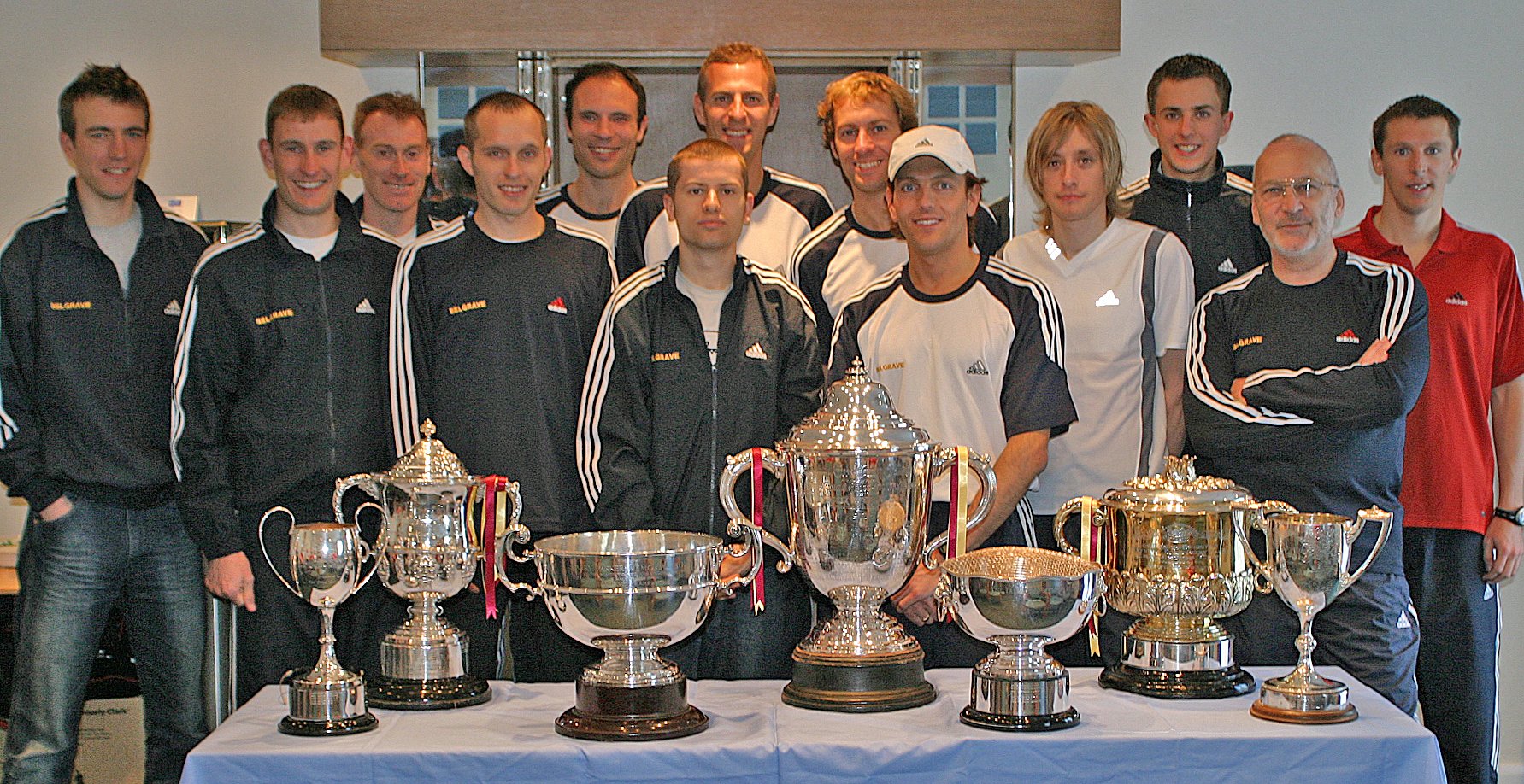  The men's road relay team and its silverware before the National 12-Stage at Sutton Park, 2004, chasing a third win in a row. Team manager Alan Mead stands second from right. Photo:  Alan Mead's archive  
