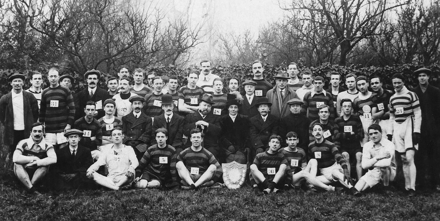Belgrave Harriers runners and officials with the H.T. Blackstaffe Shield at Raynes Park, January 1914